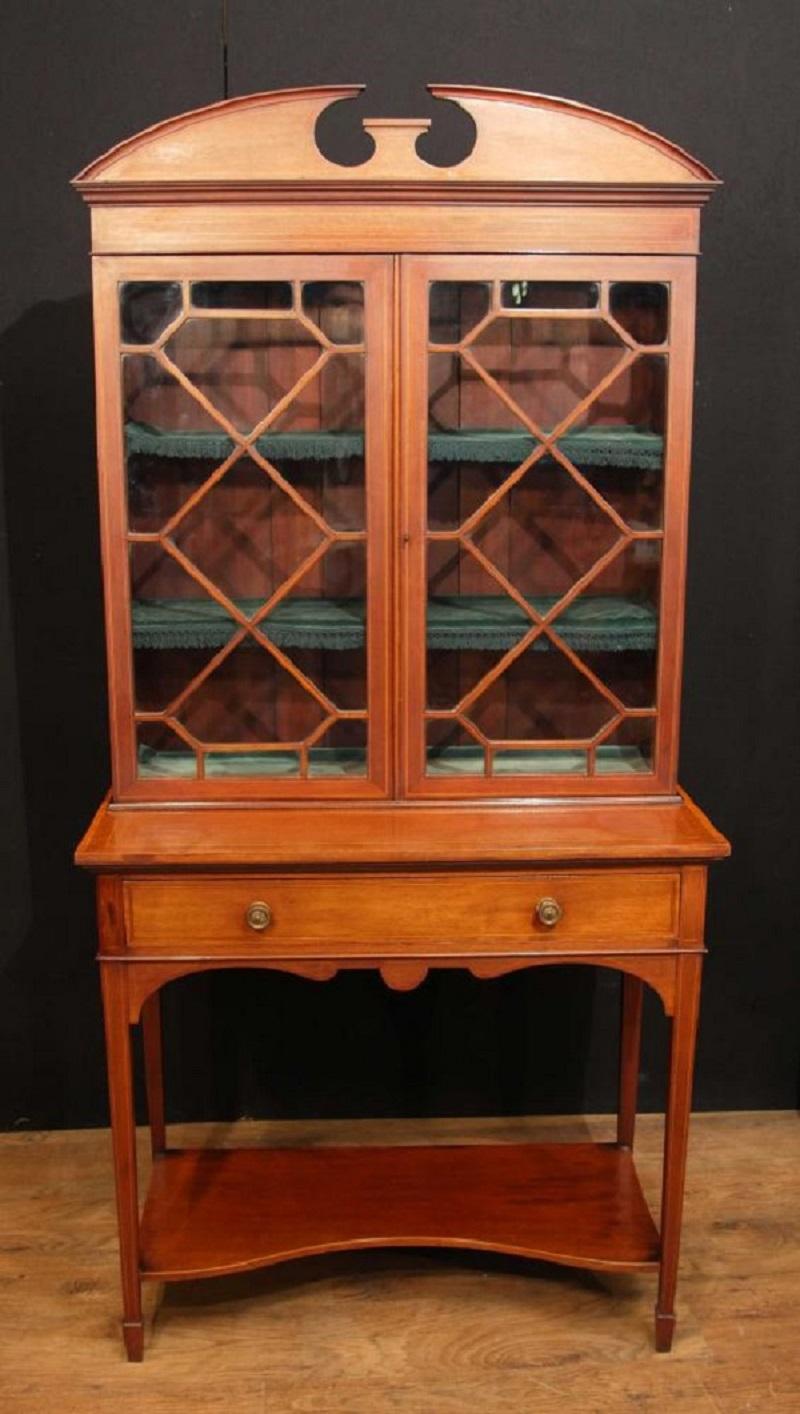 - Stunning antique Edwardian china cabinet or bookase in the Sheraton manner
- Lovely delicate design with glass fronted top
- Love the curved broken arch pediment surmounting the piece
- Purchased from a dealer at Newark Antiques fair
- Offered