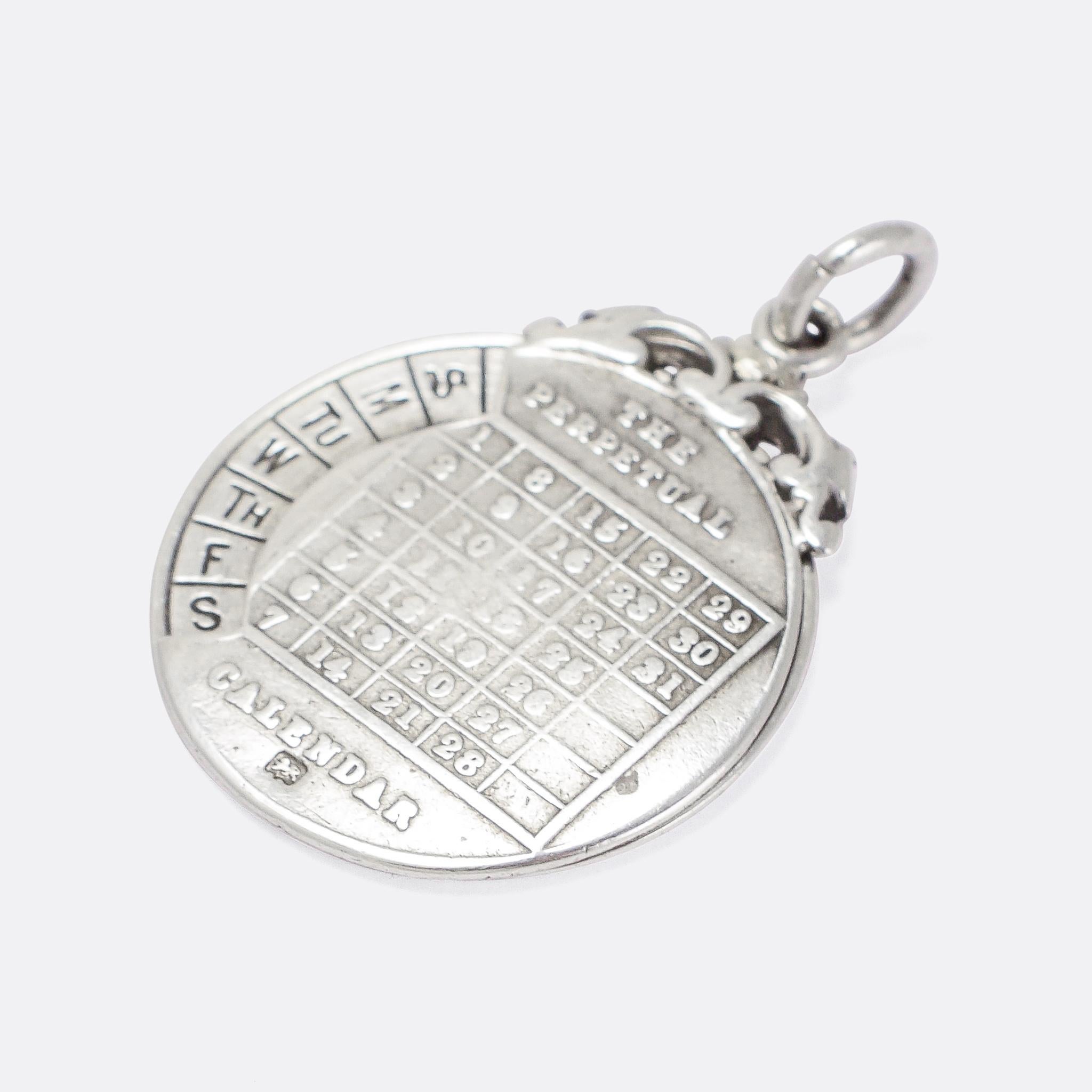 This clever Edwardian pendant allows the wearer to keep track of the days and dates of the month and can be adjusted by spinning the disc, so that it is accurate for any given year. It's modelled in sterling silver, and dates to the very beginning