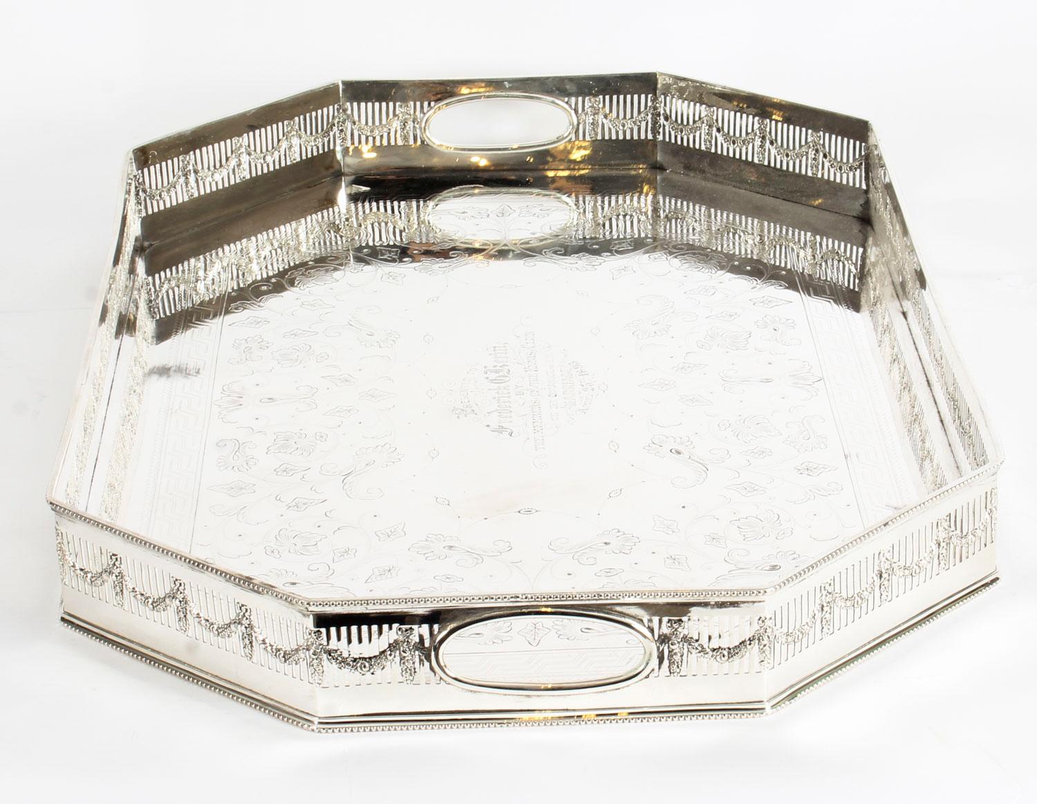This is a lovely antique Victorian silver plated gallery tray with beautiful engraved decoration bearing the makers mark G & S for the Goldsmiths & Silversmiths Company, London and circa 1880 in date.

This rectangular silver plated tray features