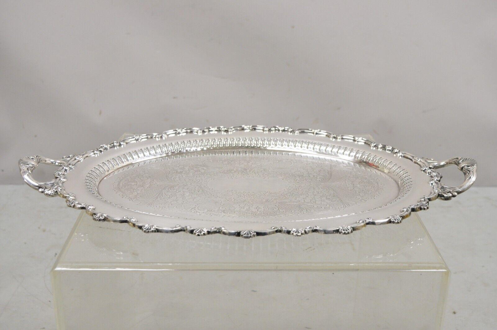 Antique Edwardian silver plated oval serving platter tray with Pierced Decoration. Item features through pierced decorated inner rim, marked 