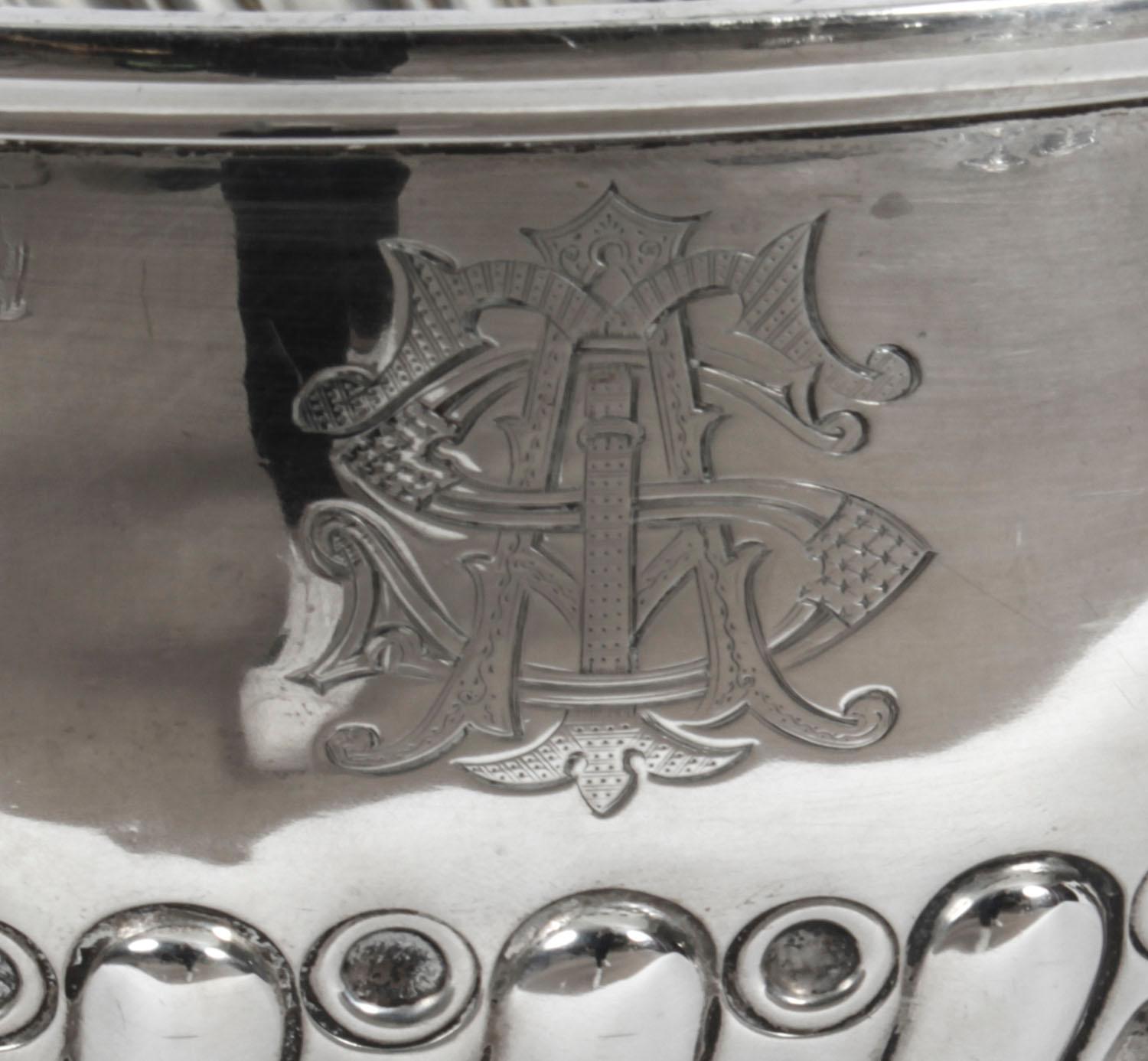 This is a large gorgeous antique Edwardian silver punch bowl bearing the makers mark of the renowned silversmiths Goldsmiths & Silversmiths Company and hallmarks for London, 1901.
 
This exquisite punch bowl is also ideal as a champagne cooler and