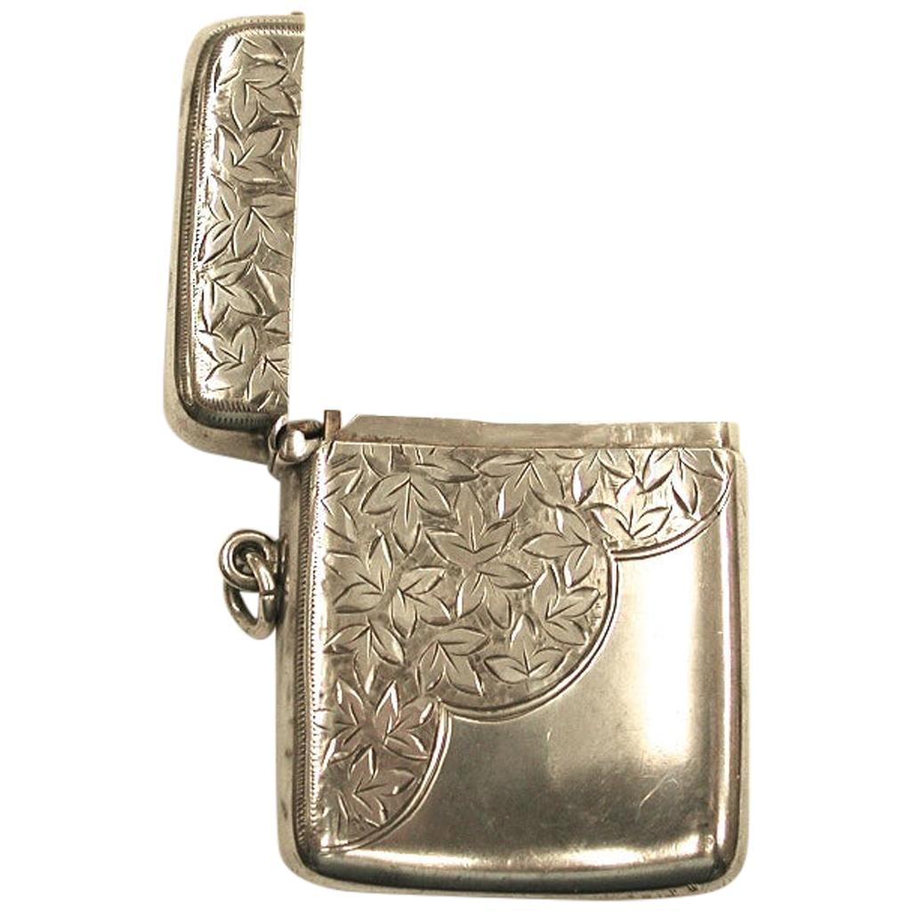 Small antique silver engraved vesta case