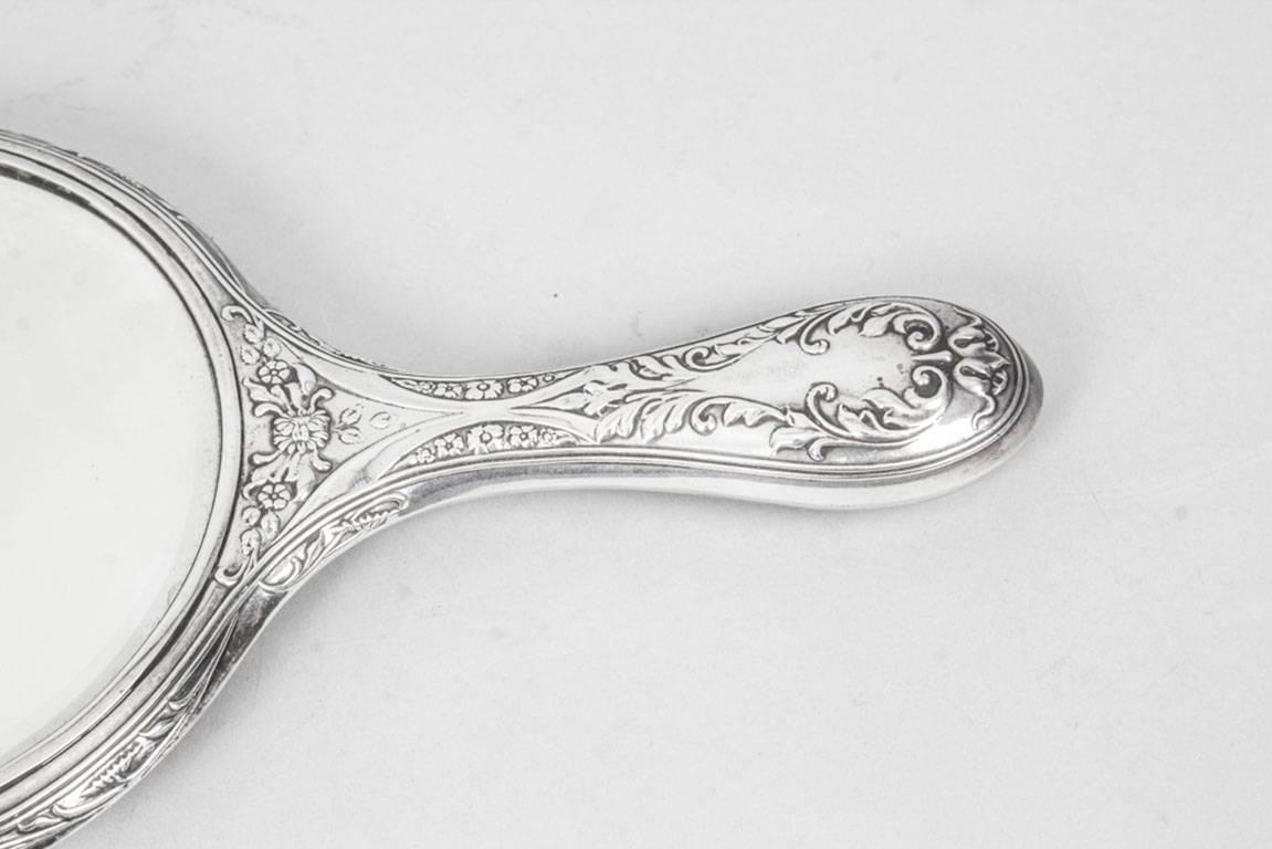 English Antique Edwardian Sterling Silver and Embossed Hand Mirror 1909 by Walker & Hall