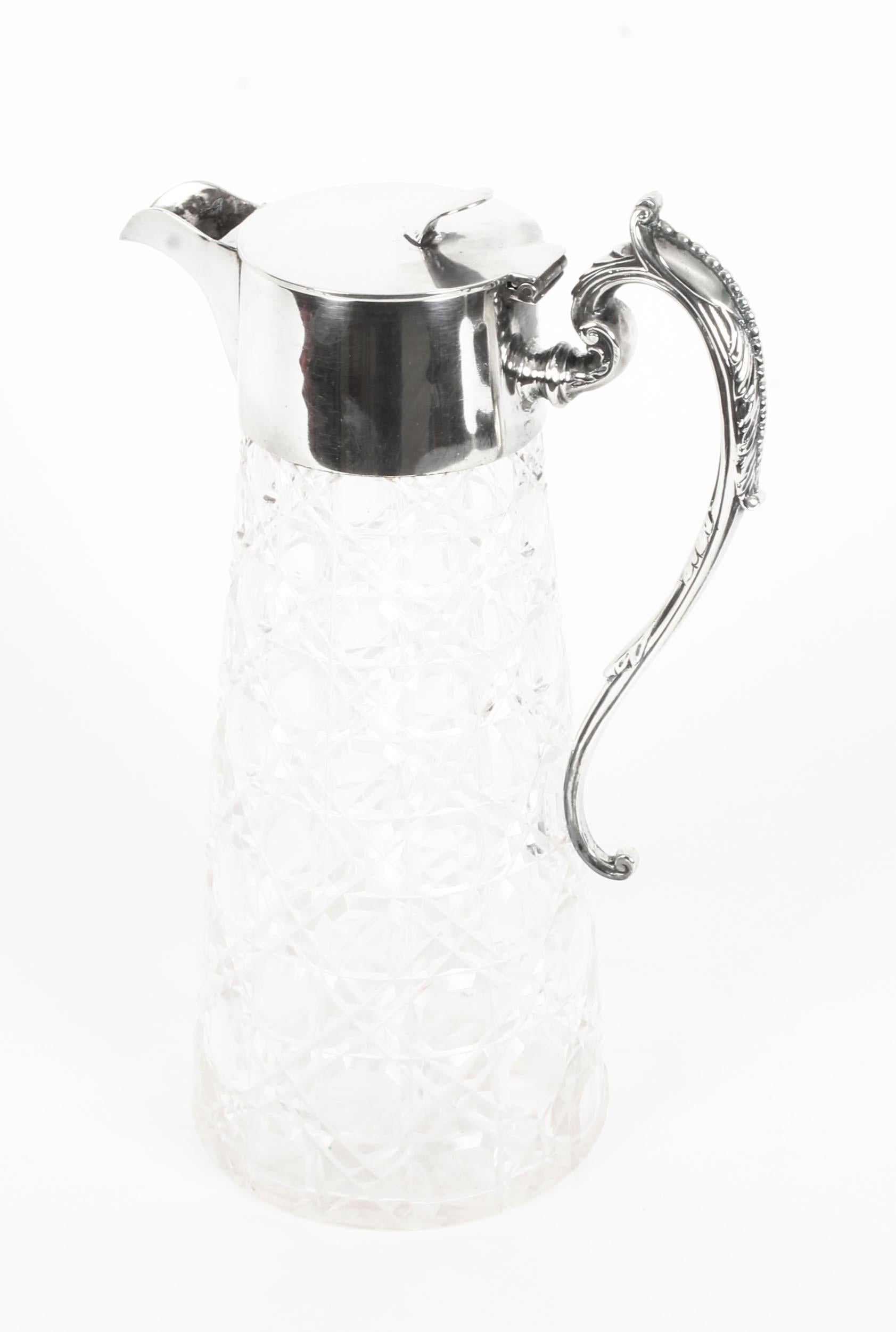 This is a wonderful Antique English Edwardian clear cut crystal and sterling silver mounted claret jug, with hallmarks for Sheffield, 1907.
 
This lovely claret jug bears the makers' mark of Marples & Co, Sheffield, who were a wholly-owned