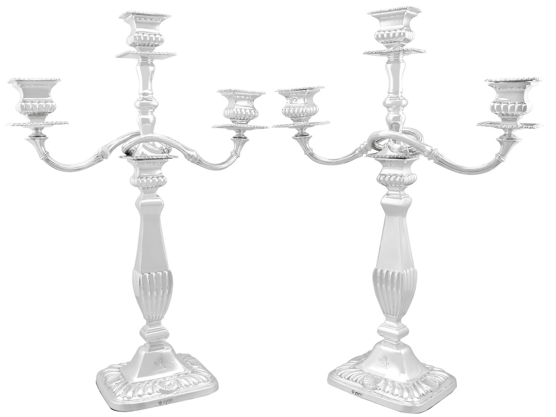 A magnificent, fine and impressive pair antique Edwardian English sterling silver three-light candelabra; an addition to our ornamental silverware collection

These magnificent antique Edwardian 3-light candelabra in sterling silver have a rounded