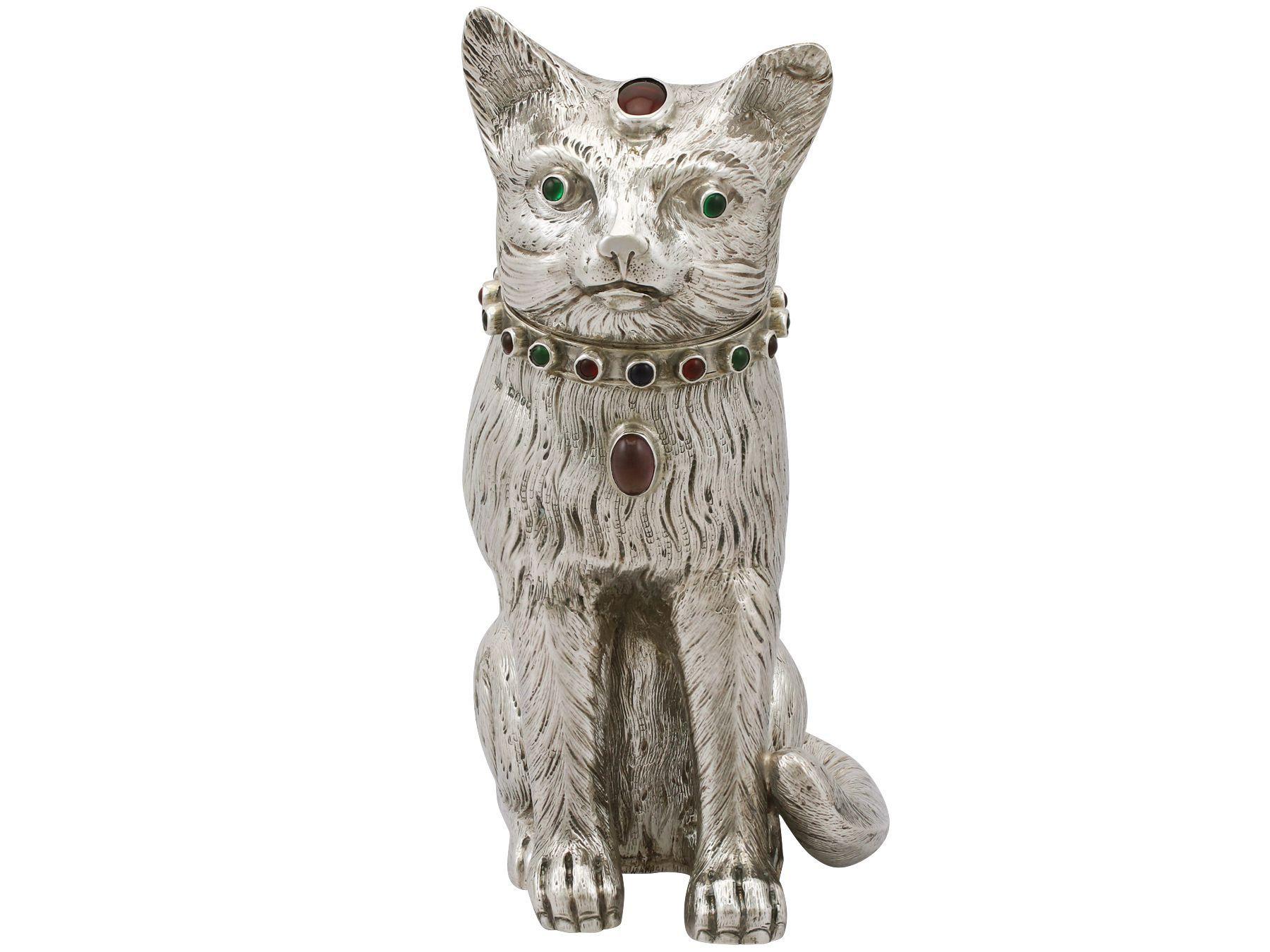 An exceptional, fine and impressive antique Edwardian sterling silver sugar box realistically modelled in the form of a cat; an addition to our animal related silverware collection

This exceptional antique Edwardian sterling silver sugar box has