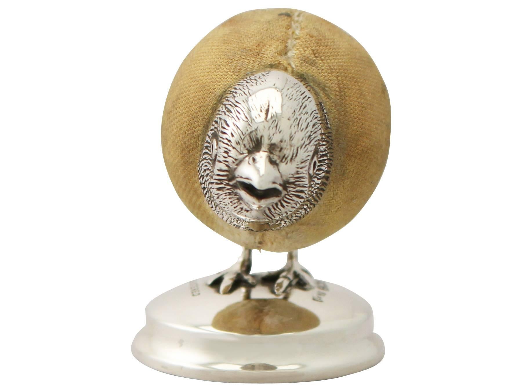 A fine and impressive antique Edwardian sterling silver pin cushion modelled in the form of a chick; an addition to our animal related silverware collection.

This fine antique Edwardian sterling silver pin cushion has been realistically modelled