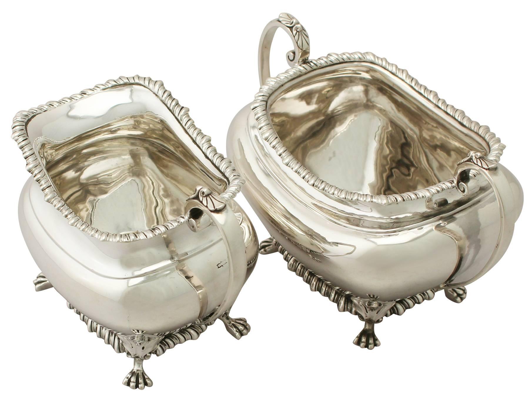 An exceptional, fine and impressive antique Edwardian English sterling silver creamer and sugar set, an addition to our Edwardian silver teaware collection.

This exceptional antique Edwardian English sterling silver cream jug and sugar set have a