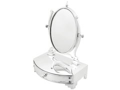 Espejo cheval de tocador y joyero de plata de ley