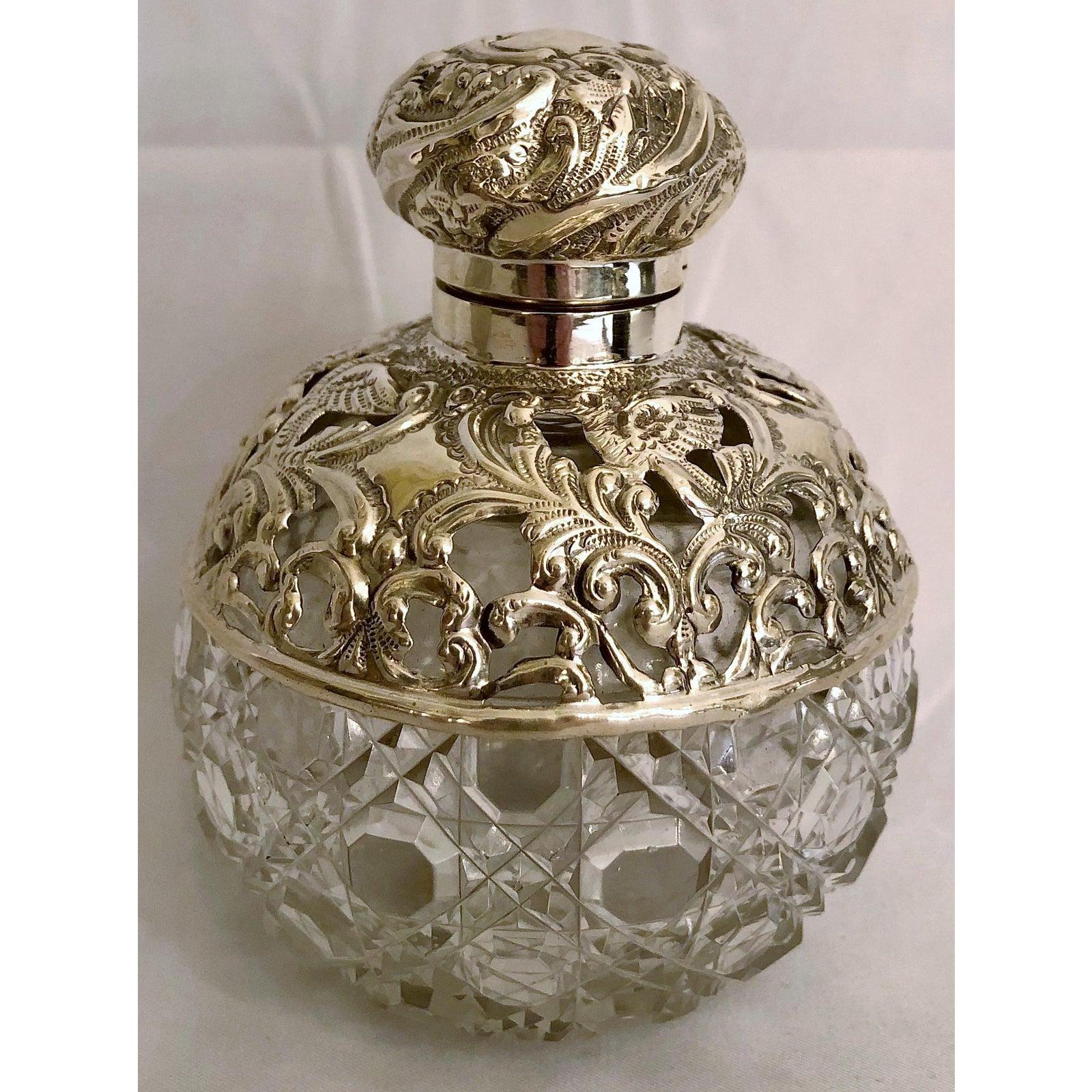 Antique Edwardian sterling silver mounted cut crystal perfume bottle, circa 1900.
 
