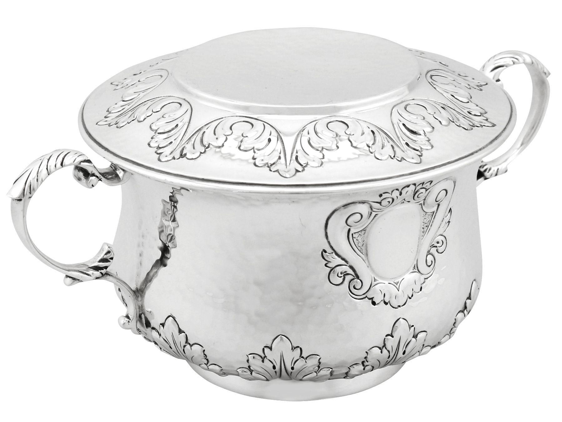 An exceptional, fine and impressive antique Edwardian English sterling silver porringer; an addition to our silver presentation collection

This exceptional antique Edwardian sterling silver porringer and cover has a plain baluster shaped form