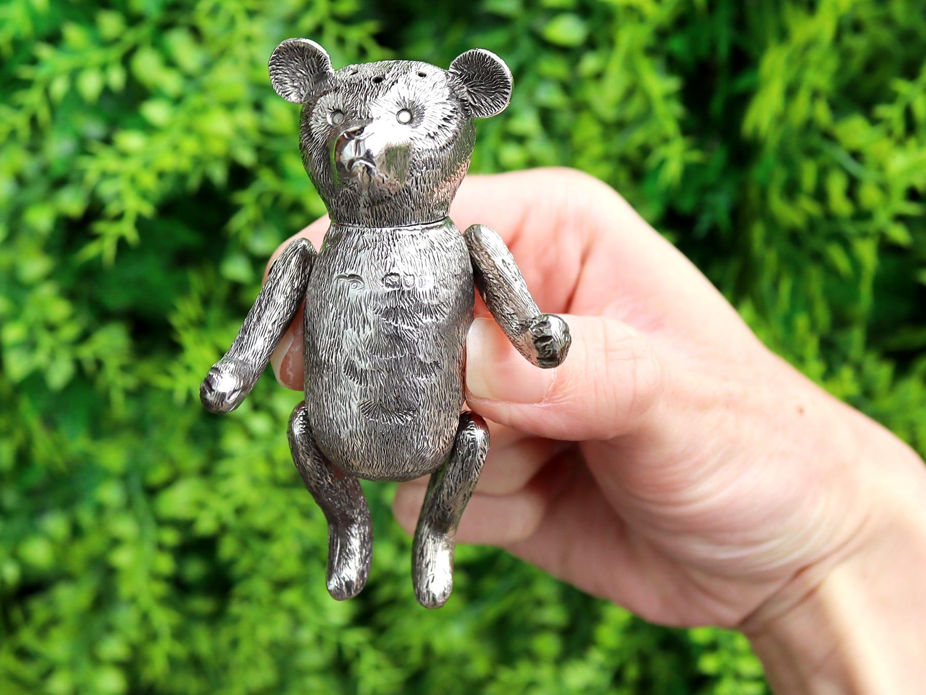 An exceptional, fine and impressive, rare antique Edwardian English sterling silver teddy bear pepper; an addition to our range of silver novelty items.

This exceptional and rare antique Edwardian sterling silver pepperette has been realistically