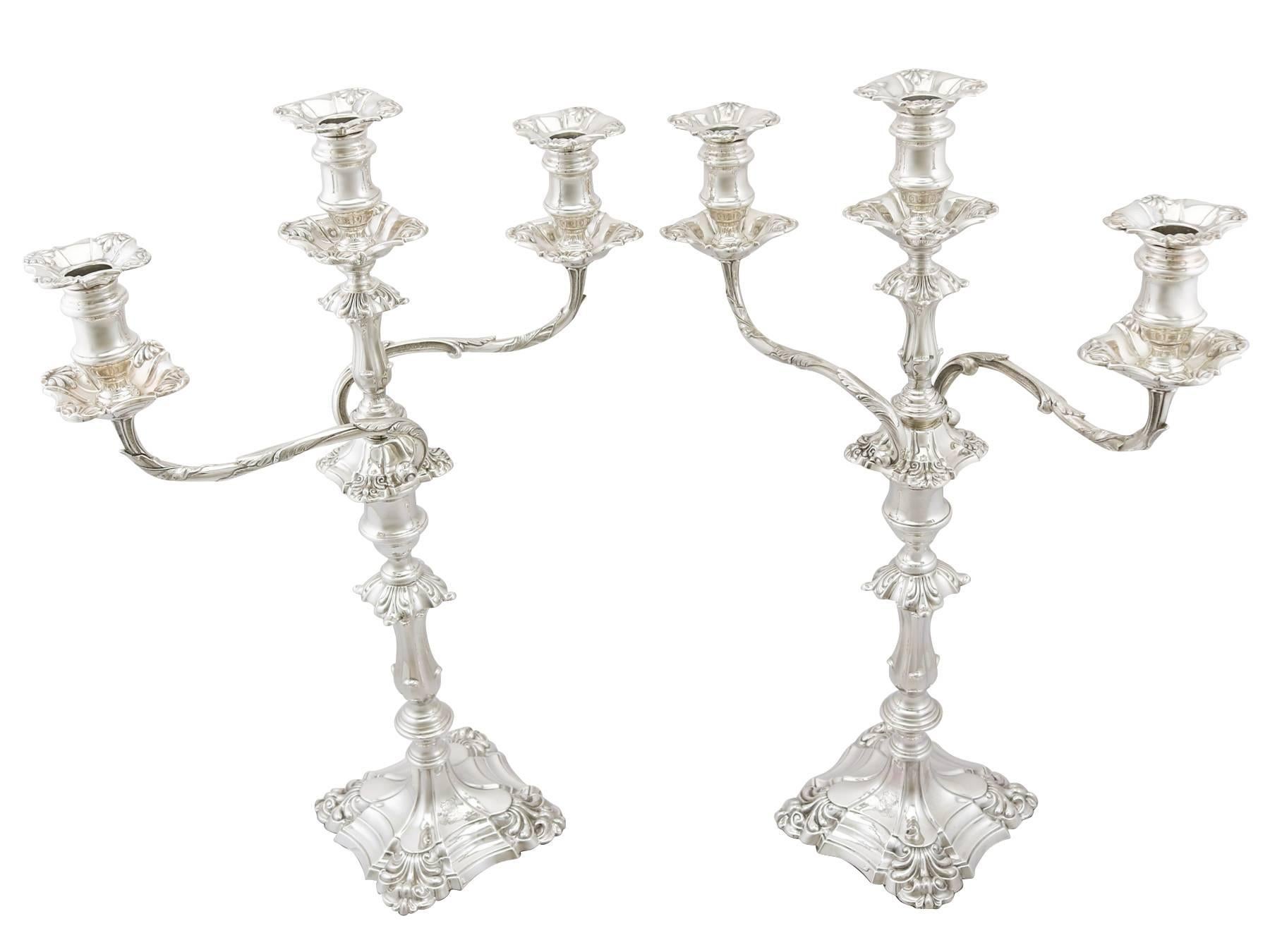 An exceptional, fine and impressive pair of antique Edwardian English sterling silver three-light candelabra made by Mappin & Webb Ltd; an addition to our ornamental silverware collection.

These exceptional antique Edwardian sterling silver
