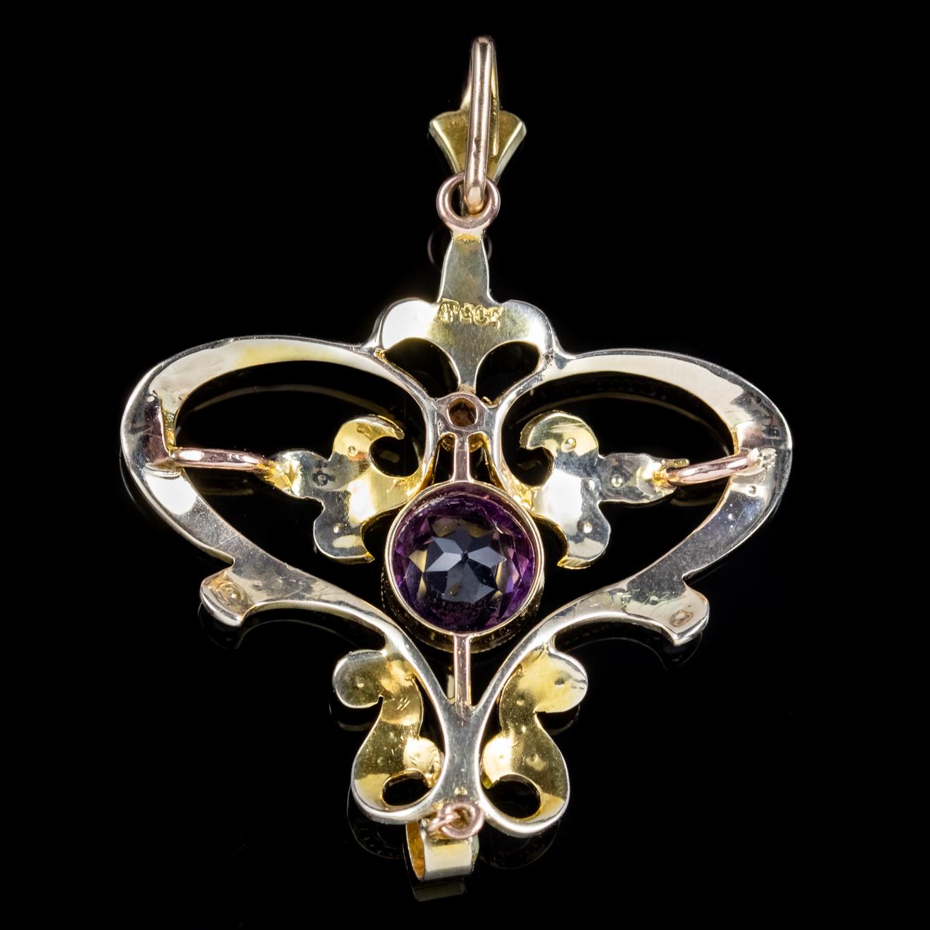 A fabulous antique Suffragette pendant from the Edwardian era decorated with Pearls and adorned with a 0.20ct Peridot dropper and a 1.80ct Amethyst in the centre. 

Suffragette jewellery was worn to show one’s allegiance to the women’s Suffragette