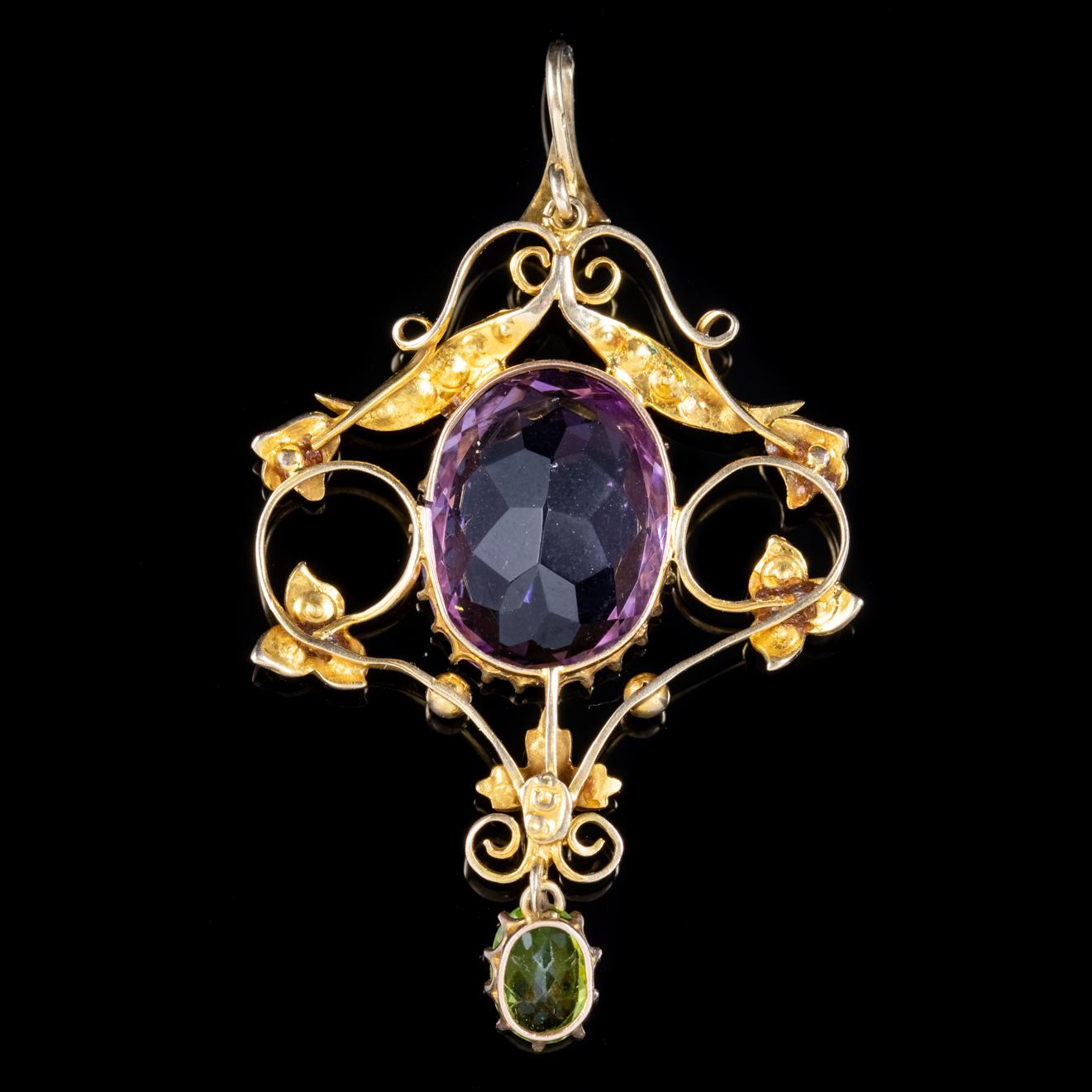 A splendid antique Suffragette pendant from the Edwardian era decorated with Pearls and a lovely Peridot dropper with an impressive 8ct Amethyst in the centre. Suffragette jewellery was worn to show one’s allegiance to the women’s Suffragette