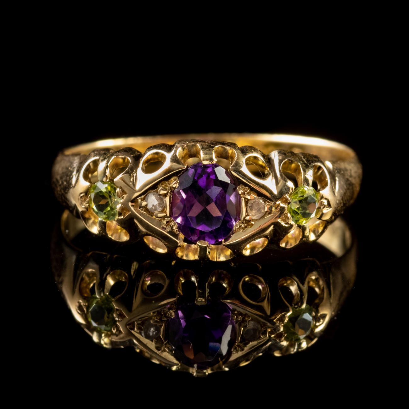 This beautiful Antique Edwardian Suffragette ring has been commissioned in 15ct Yellow Gold and set with a beautiful central 0.25ct Amethyst. Flanking the Amethyst are two wonderful sparkling Diamonds and further towards the shoulders are two 0.10ct