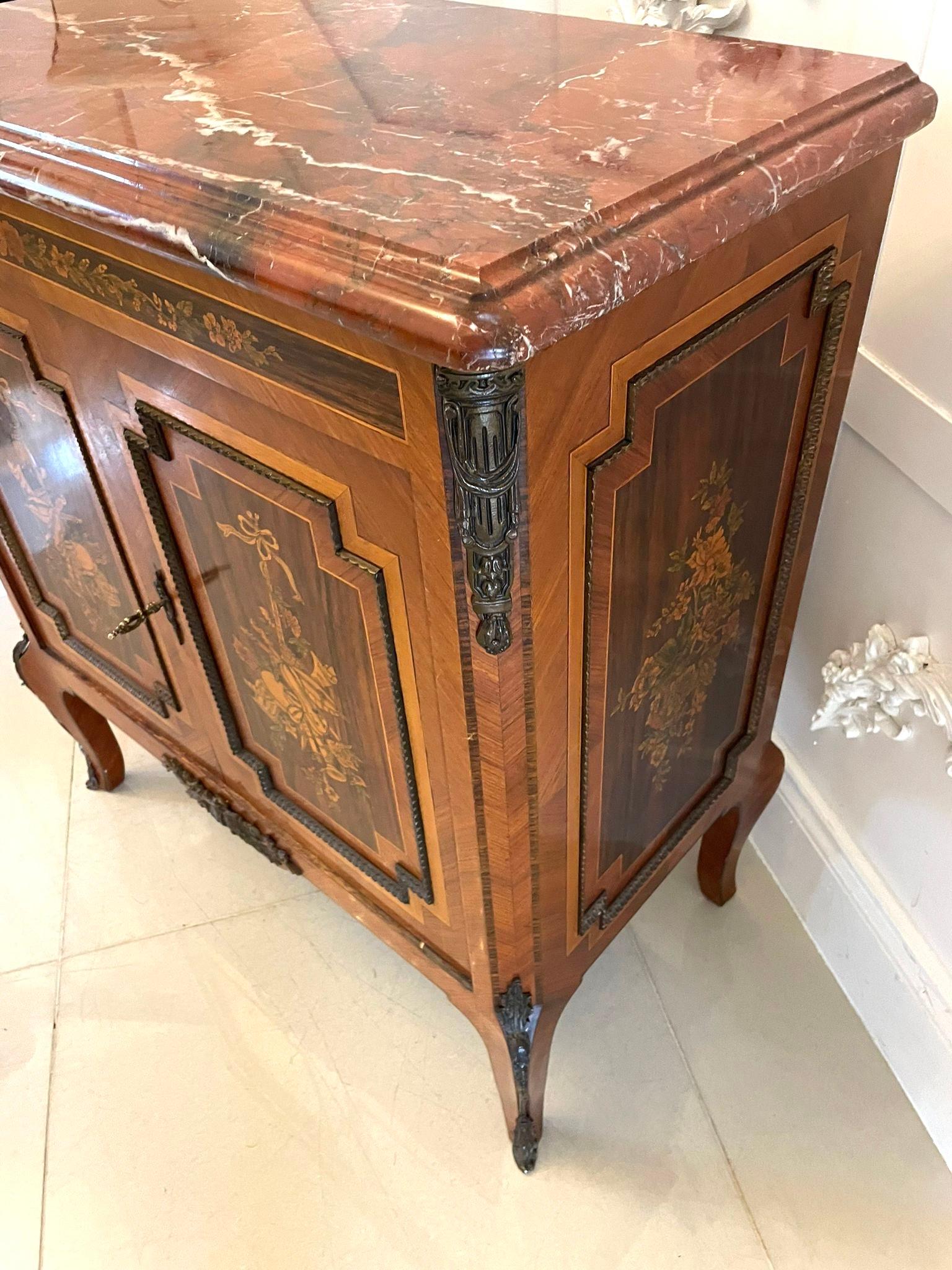 Antique Edwardian superior quality French kingwood and marquetry inlaid side cabinet having a beautiful marble top with a moulded edge above a marquetry inlaid frieze above a pair of outstanding quality marquetry inlaid panelled doors with ornate