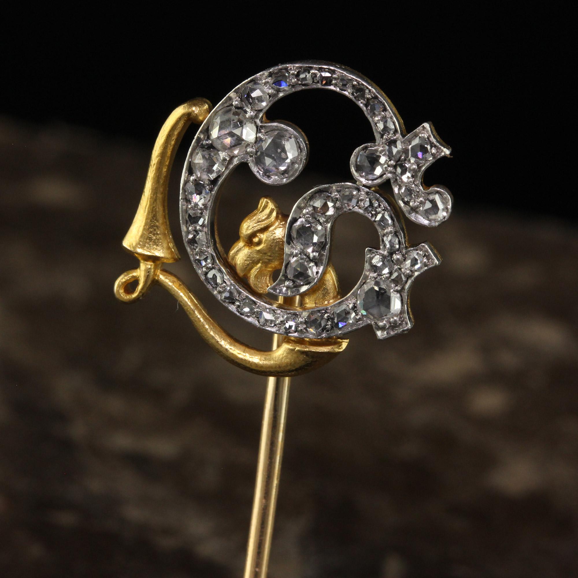 Beautiful Antique Edwardian Theodore B. Starr Rose Cut Diamond Griffin Stick Pin. This gorgeous Art Deco stick pin is crafted in 18k yellow gold and platinum. The top of the stick pin has gorgeous rose cut diamonds with a head of a griffin. The top