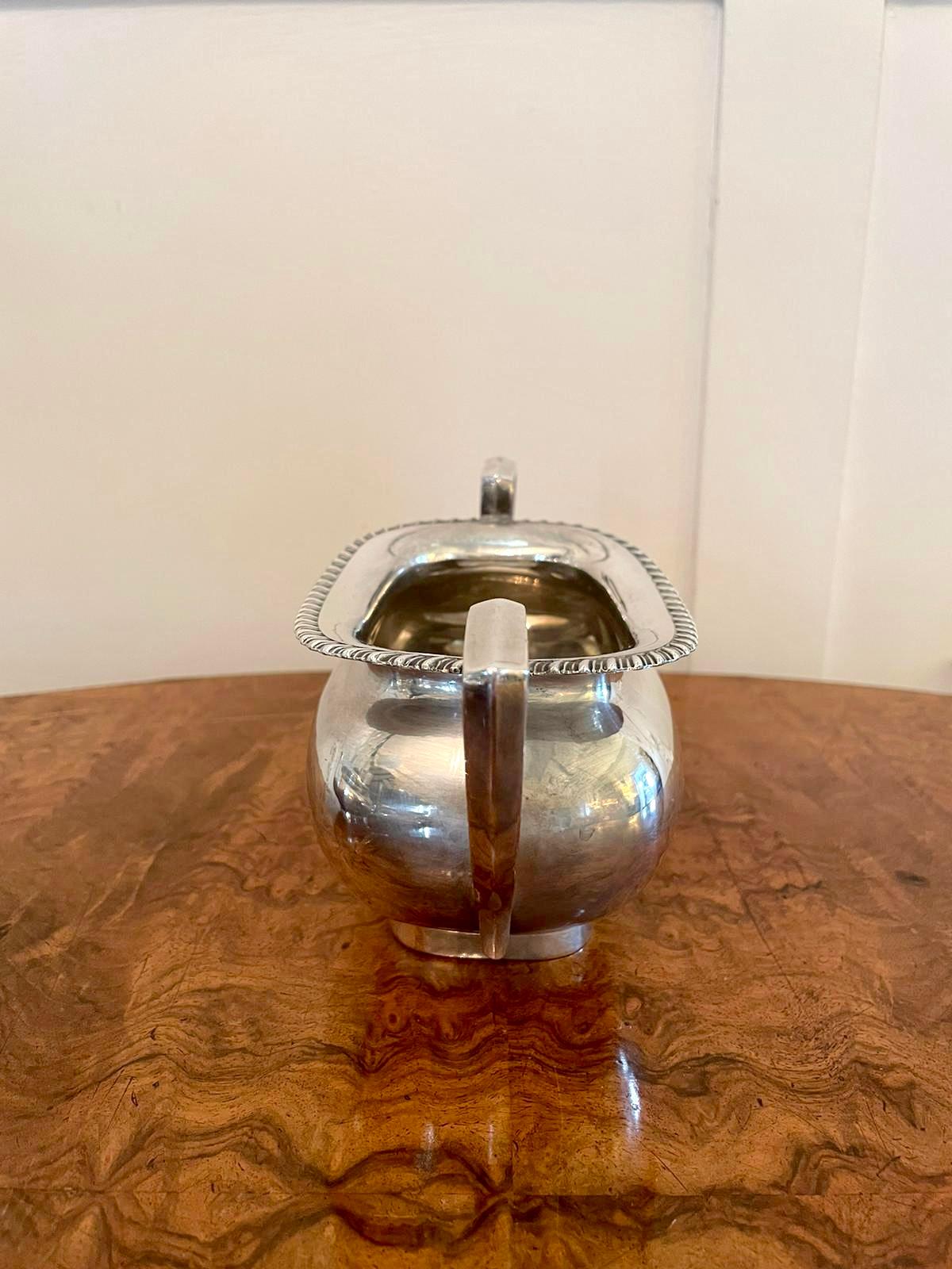 Antique Edwardian three piece silver plated tea set by Walker & Hall consisting of a teapot, sugar bowl and milk jug all with reeded edge and shaped handles. The teapot has a lift up lid and original finial.

This very attractive set is in mint