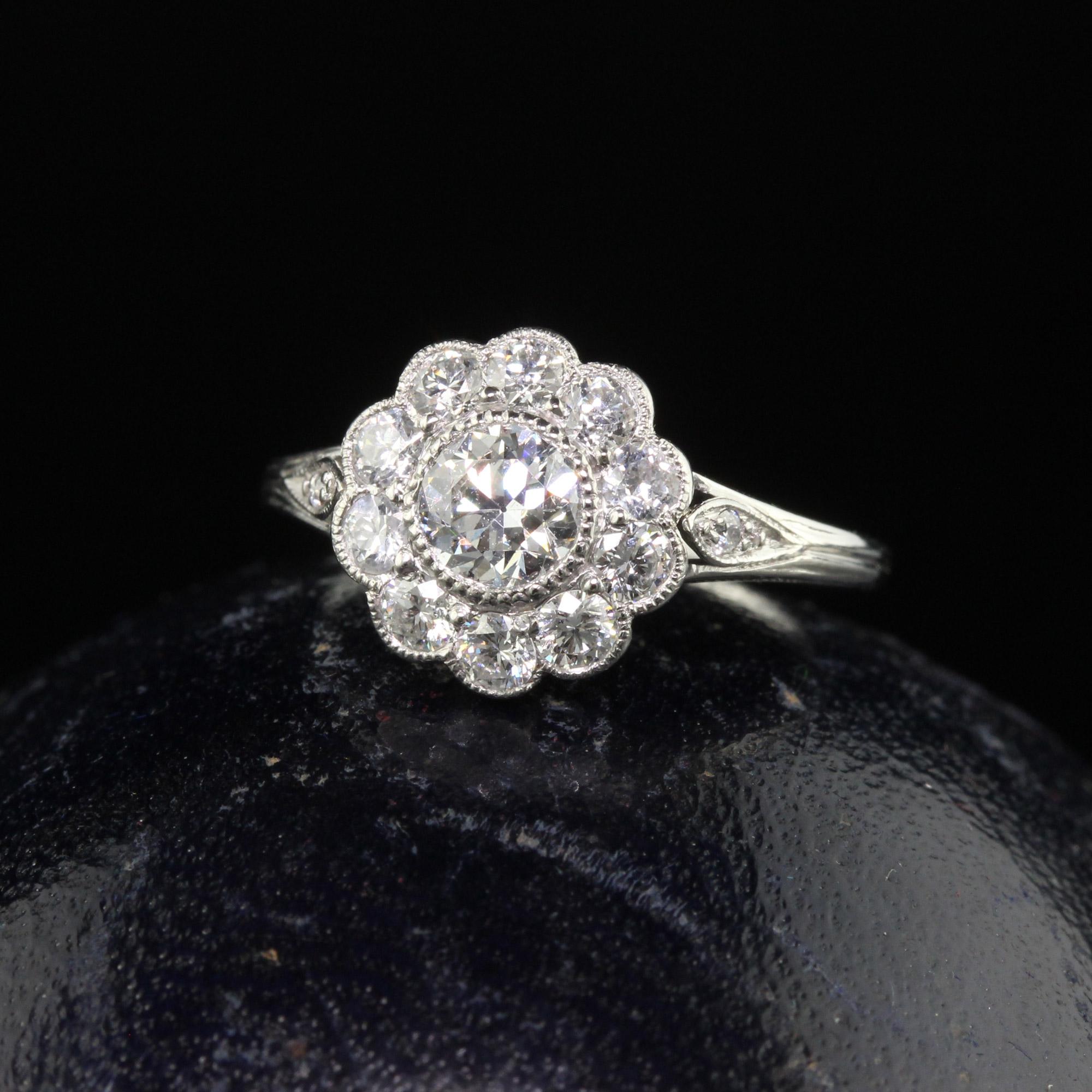 Beautiful Antique Edwardian Tiffany and Co Platinum Old Euro Diamond Engagement Ring. This incredible Tiffany and co engagement ring is crafted in platinum. The center holds an old European cut diamond that is surrounded by other old European cut