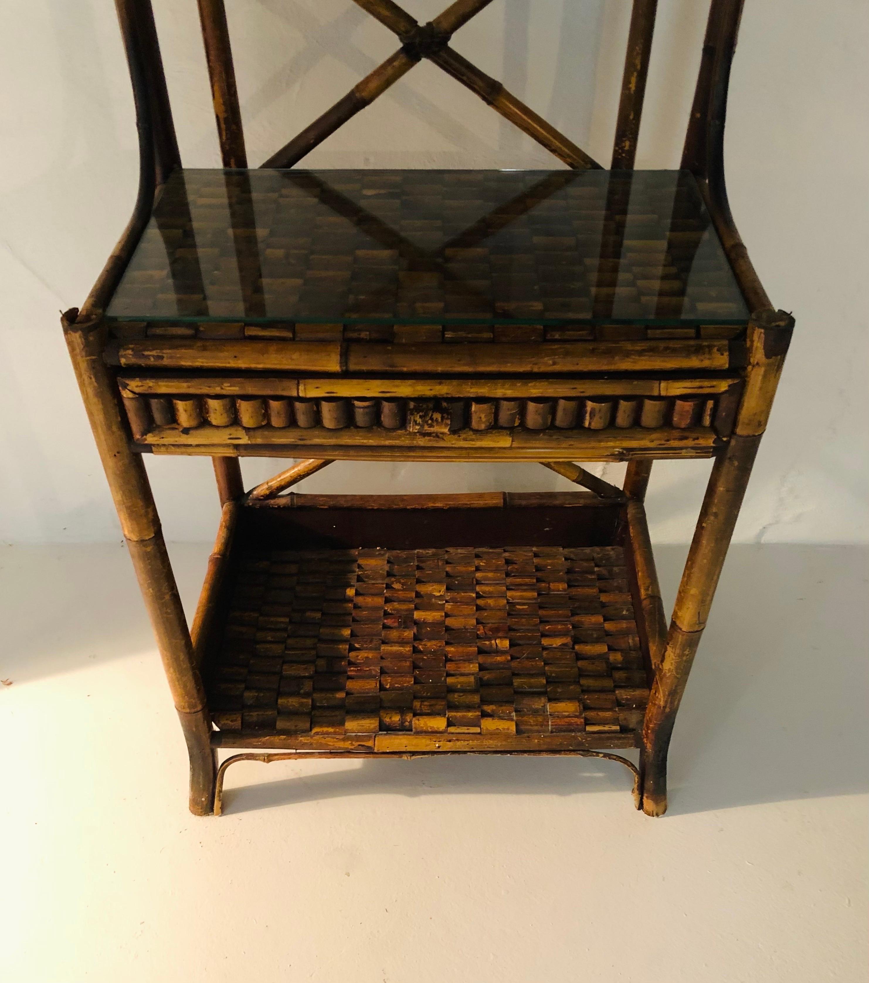 This is a wonderful antique burnt bamboo vanity dressing table, dating to around the turn of the century, While this beautiful piece is an antique, it can still function for actual use. The drawer glides in & out smoothly, and the piece is