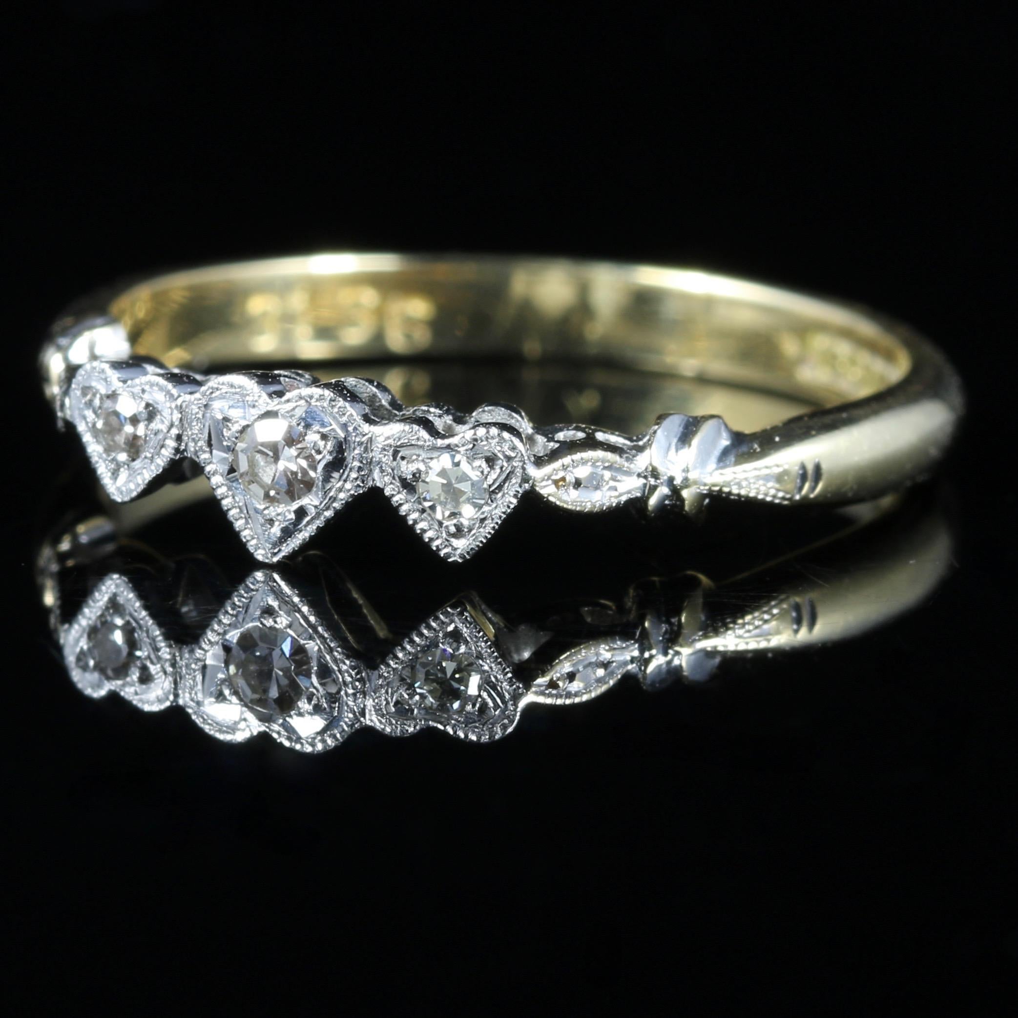 For more details please click continue reading down below...

This fabulous antique Edwardian triple Diamond heart ring is Circa 1915.

Crowned with 3 sparkling Diamonds in a heart shape gallery.

Smaller Diamonds also chase down the