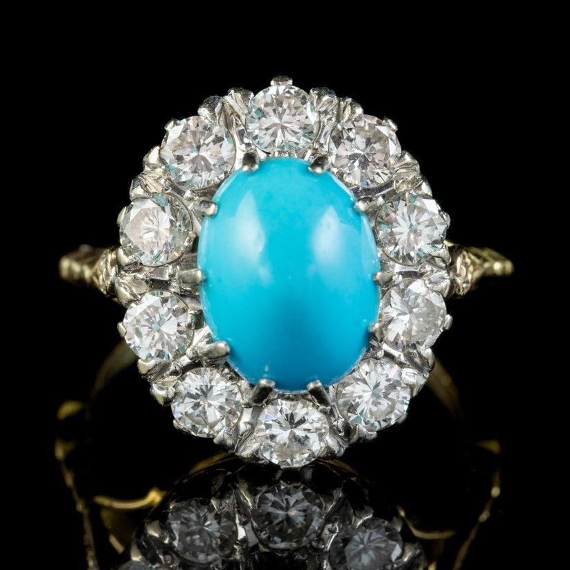 A spectacular Antique Edwardian cluster ring claw set with an unusual dome shaped blue Turquoise stone in the centre haloed by ten sparkling Brilliant cut Diamonds which have exceptional VS 1 clarity - H colour and total to approx. 2ct. 

Turquoise