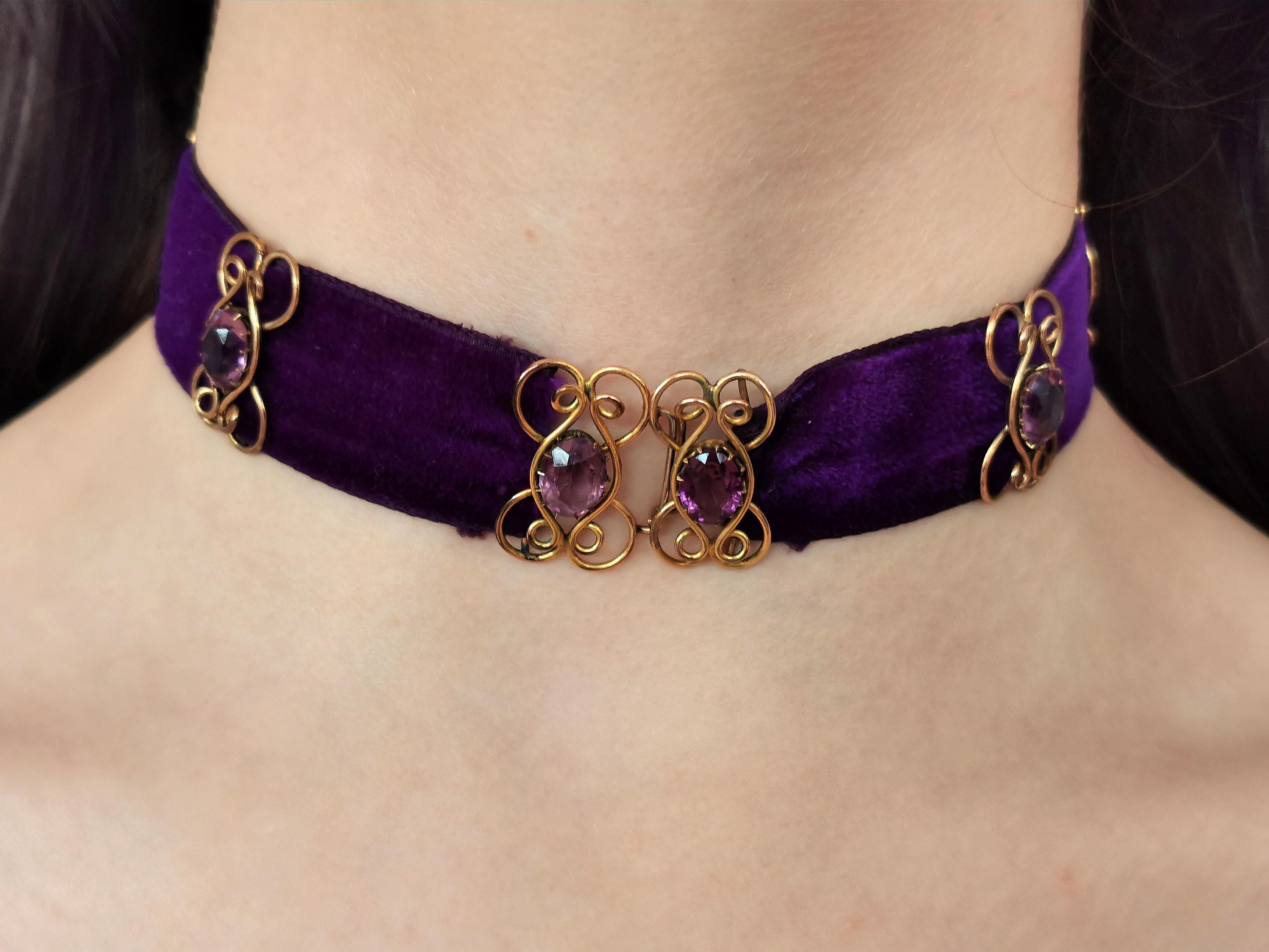 A truly beautiful antique Edwardian era, velvet and Amethyst paste choker necklace.

A rare find, this beautiful choker is made from rich and vibrant purple velvet with a short pile, the choker is decorated with amethyst paste stones.

The stones