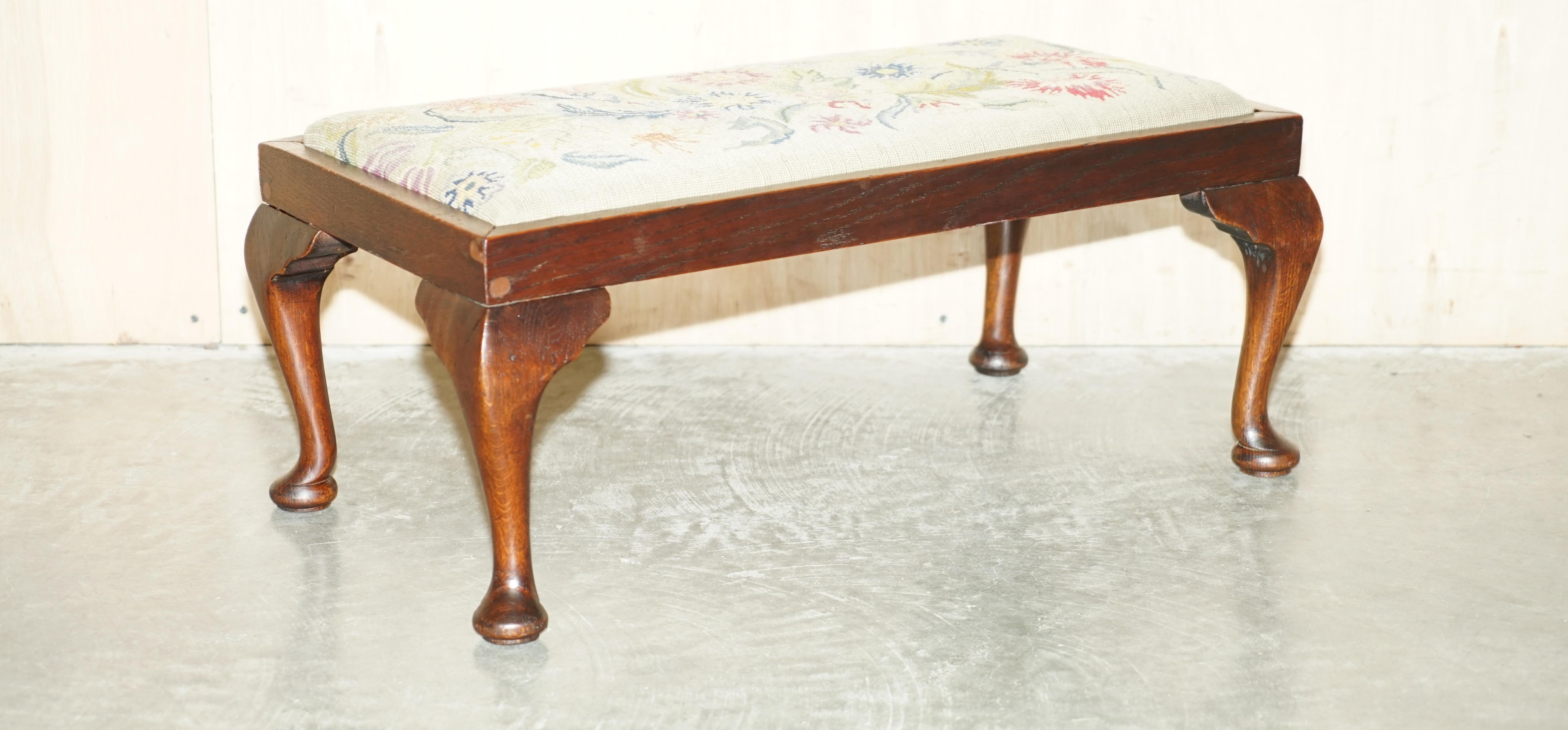 We are delighted to offer for sale this lovely original Edwardian circa 1900-1910 hand carved Walnut Cabriolet legged footstool with floral embroidered upholstery 

A very decorative and well made piece, the top has a period Victorian embroidery