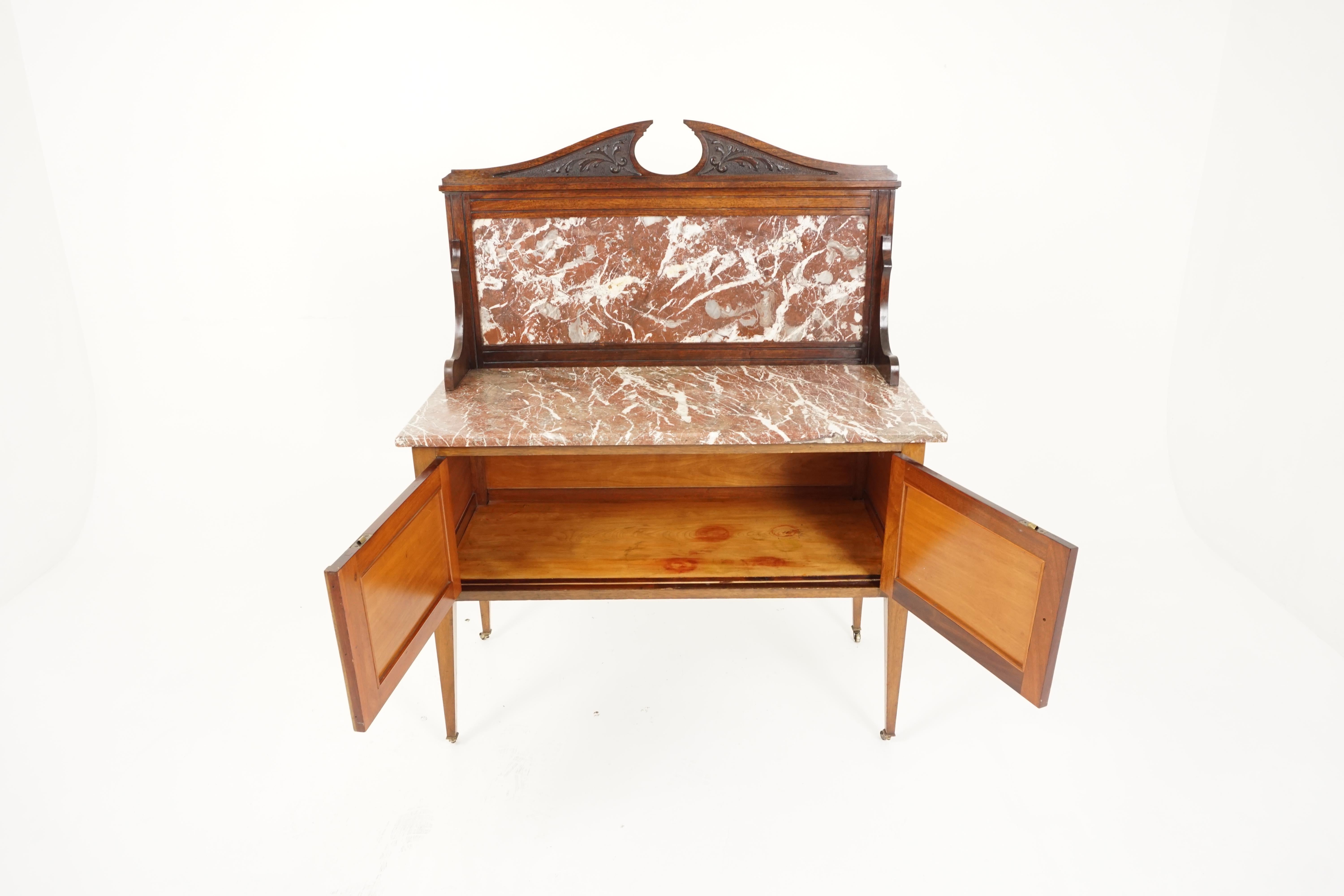 Antique Edwardian washstand, inlaid walnut, marble top, Scotland 1910, B2706

Scotland 1910
Solid walnut and inlay
Original finish
Carved pediment to the top marble top back splash
Pair of inlaid walnut doors open to reveal large storage