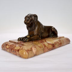Antique Egyptian Revival Bronze Sculpture of a Lion on a Marble Plinth
