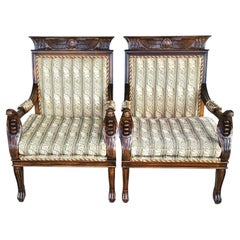 Antique Egyptian Revival Carved Cobra & Isis Wings Mahogany Armchairs, a Pair