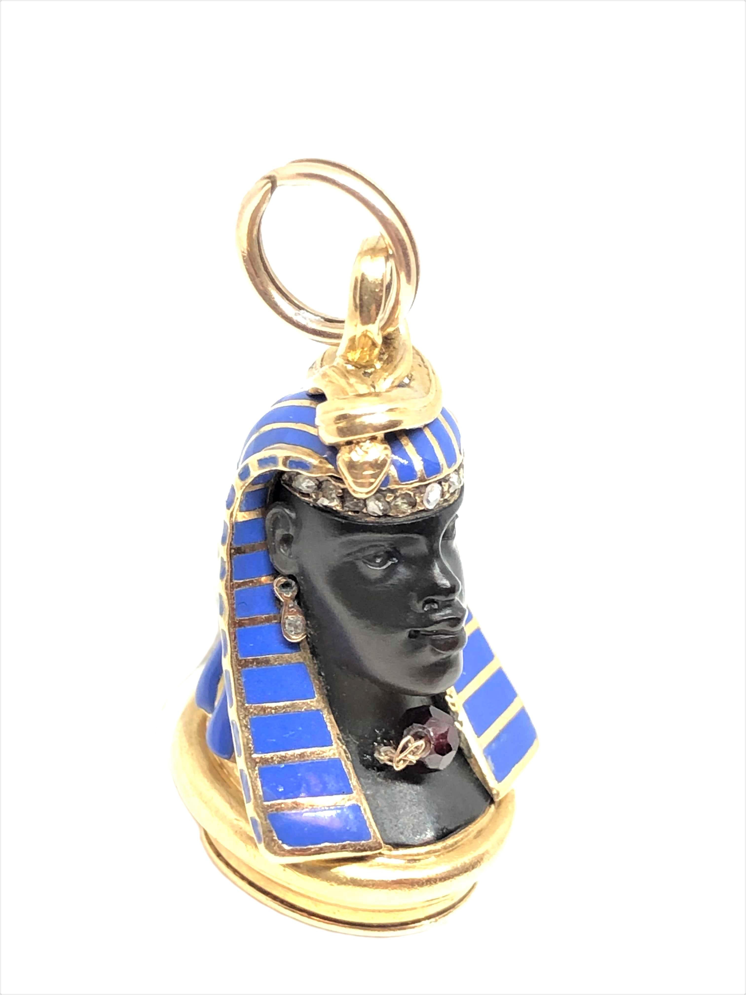 Circa 1900 14K Yellow Gold Egyptian Revival Seal Fob, measuring 1 1/4 inch in length, very nicely detailed with a carved face of Onyx, Enamel, Rose cut Diamonds and a Garnet. The Bottom is a carved Hard stone Agate Seal Fob with the letter P.