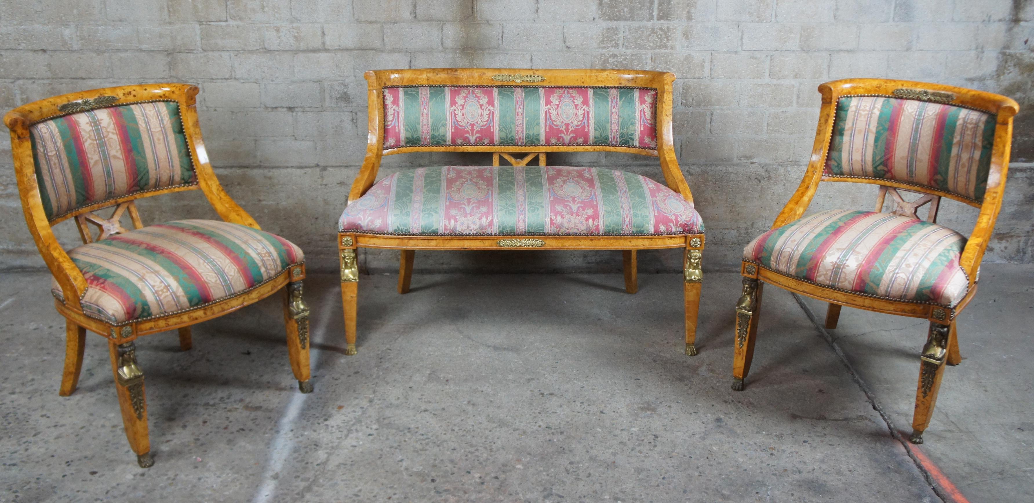Monumental early 20th century 5-piece parlor set. A neoclassical and Egyptian revival inspired design. Features a curved rail with unique X-back between contoured arms leading to regal upholstery. The chairs are supported by square tapered front