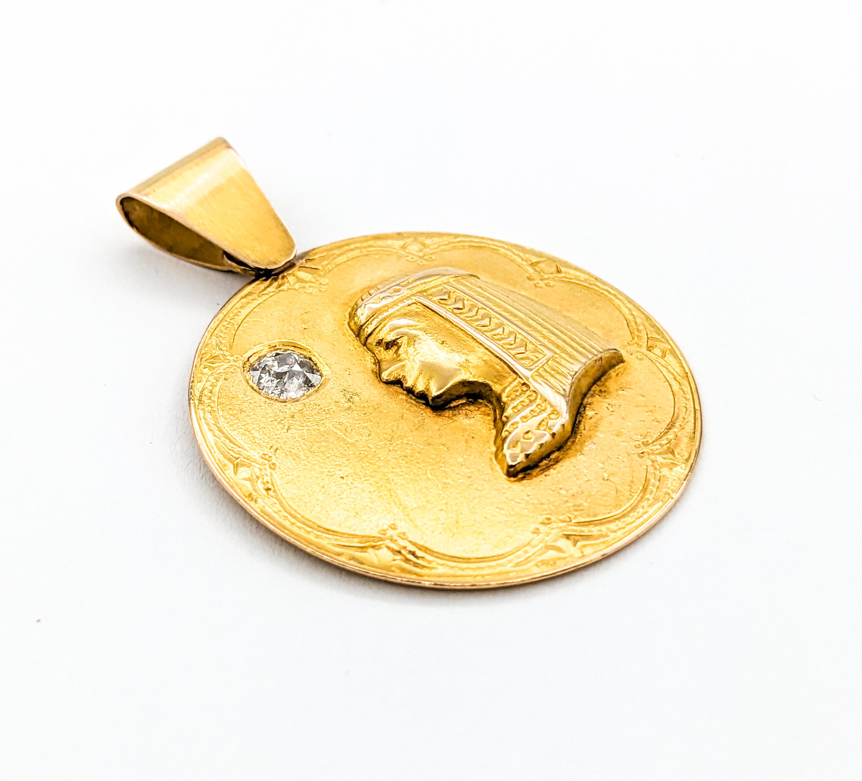Antique Egyptian Revival Pharaoh Diamond Medallion Pendant In Yellow Gold

Introducing this exquisite Antique Egypt Revival Medallion Pendant in rich 18K gold. This stunning piece features  a captivating .30 carat Mine Cut diamond with old world