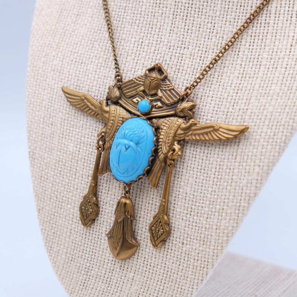Year: 1930
Hallmark: EBE
Dimensions: chain L 16 Inch, pendant H 3 Inch
Materials: base metal, faux turquoise 
