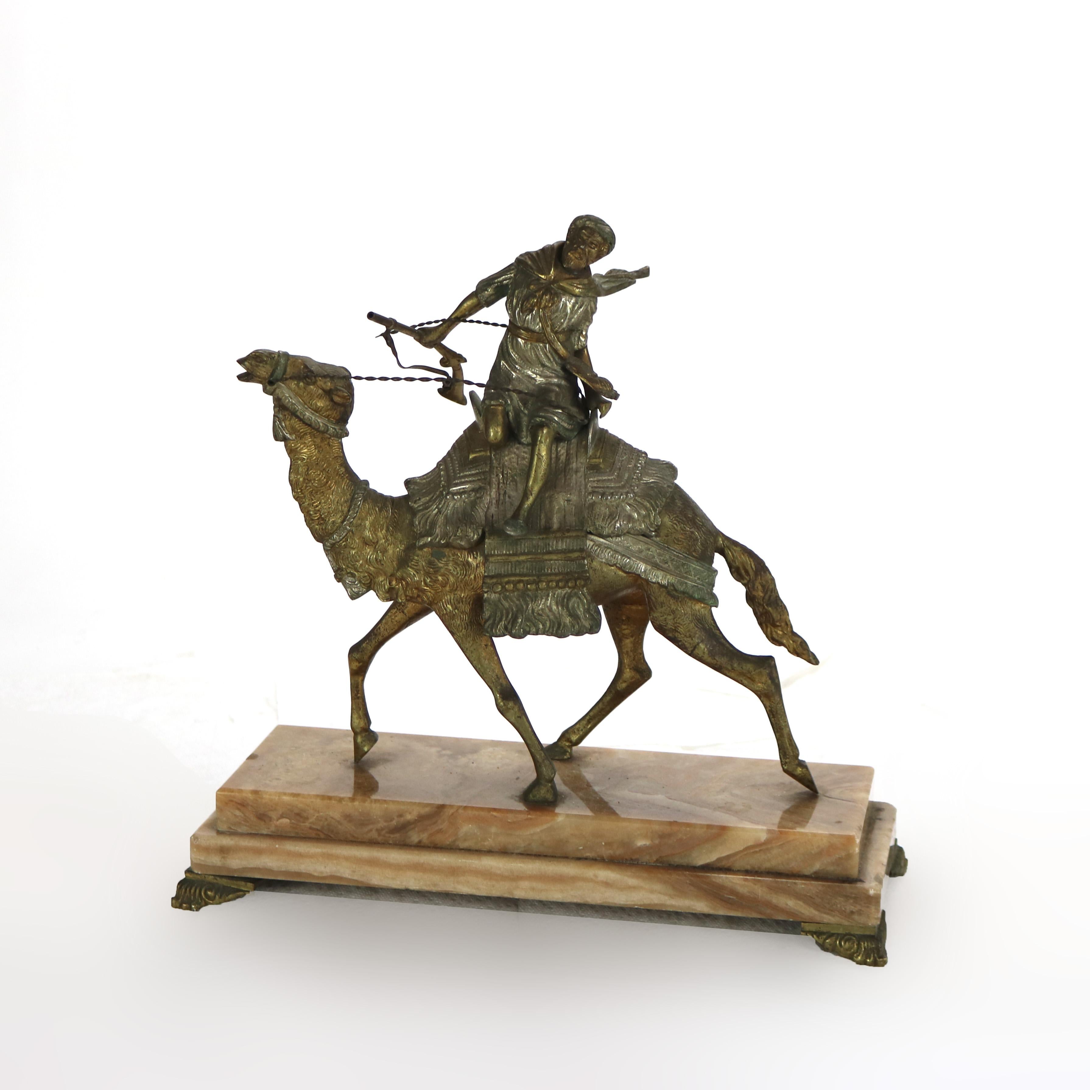 Antique Egyptian Revival Silver & Gilt Finished Sculpture of Camel & Rider on Onyx Base, C1900

Measures - 12.75