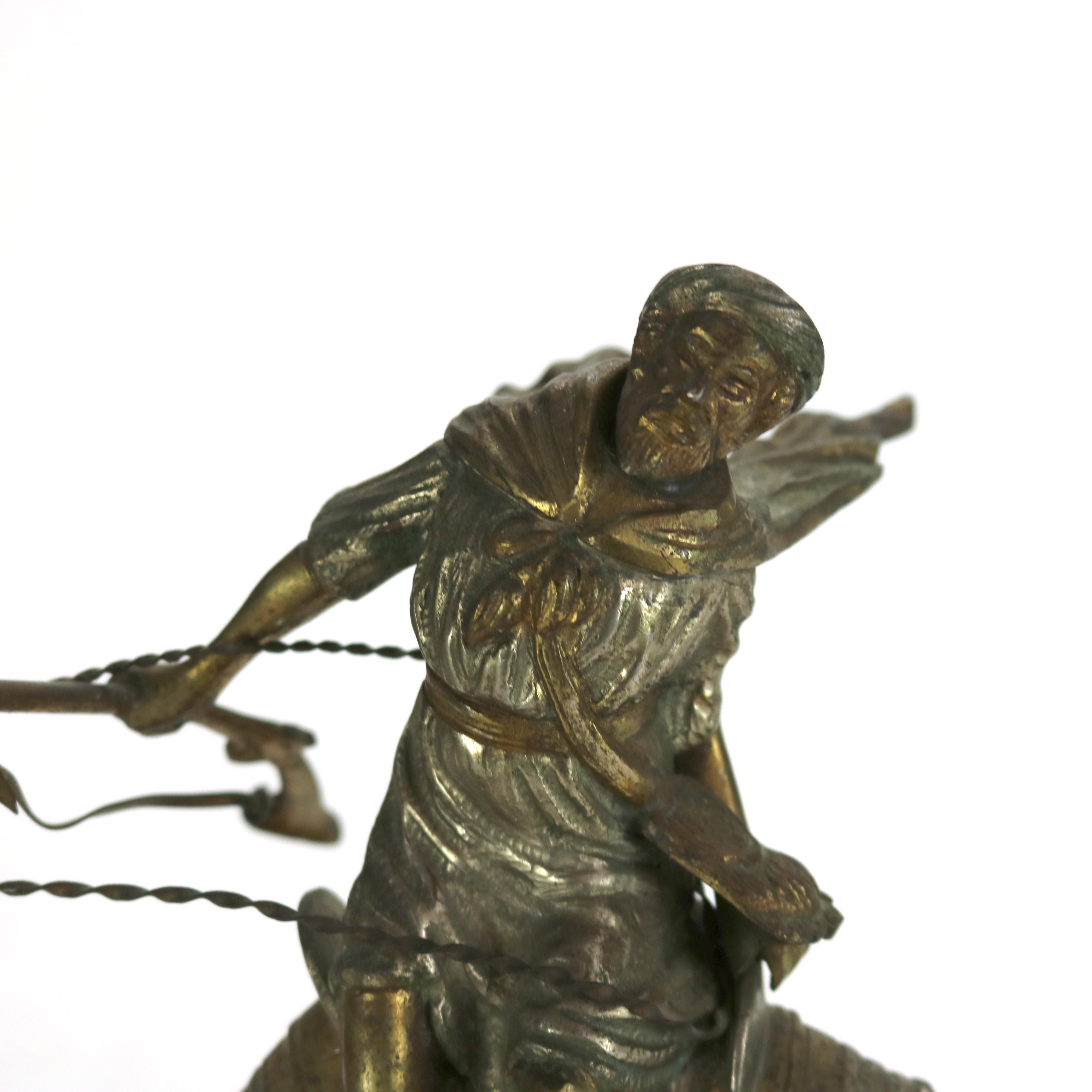Antique Egyptian Revival Silver & Gilt Finished Sculpture of Camel & Rider C1900 In Good Condition For Sale In Big Flats, NY