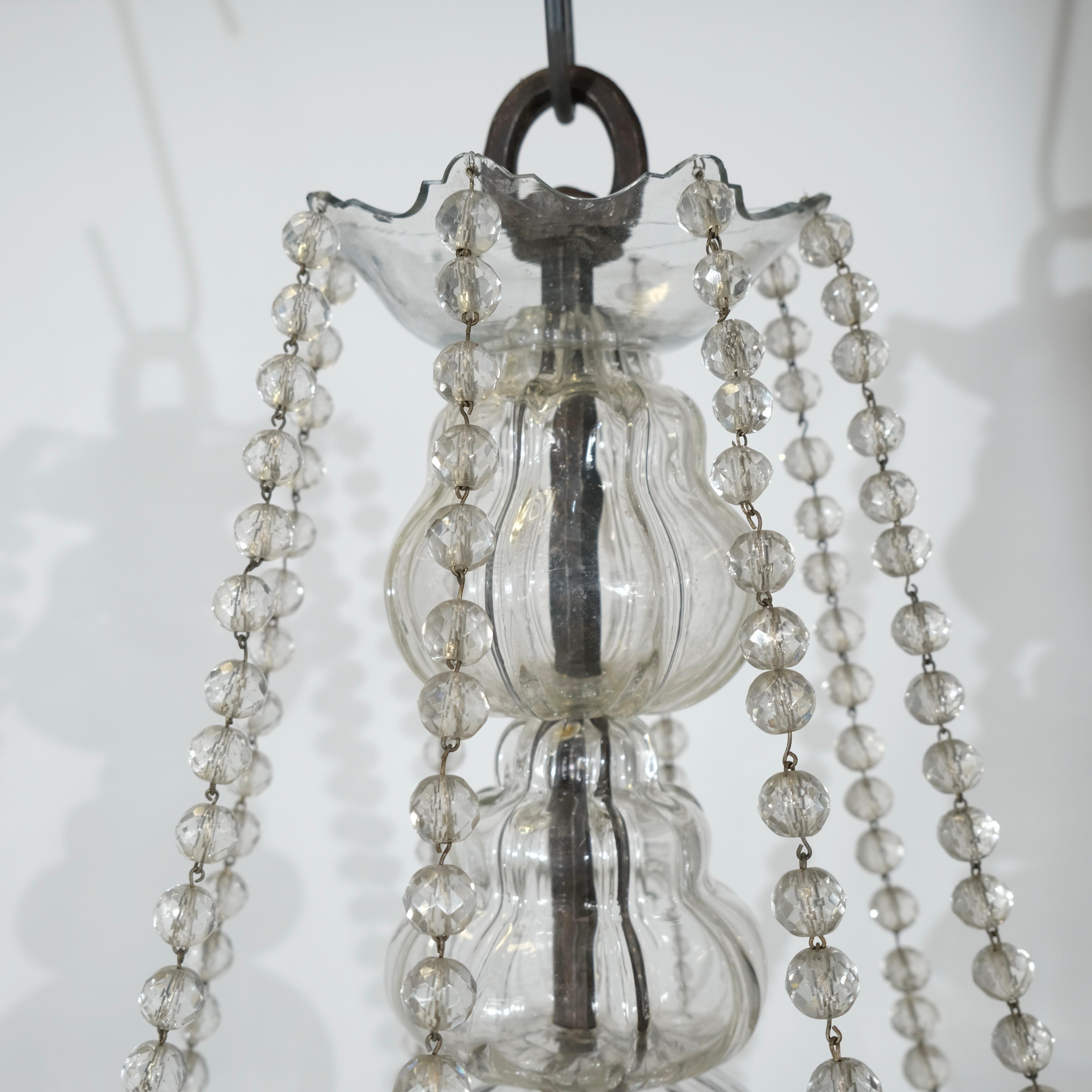 Antico lampadario a otto luci in ferro e cristallo. Inizio del XIX secolo. in vendita 4