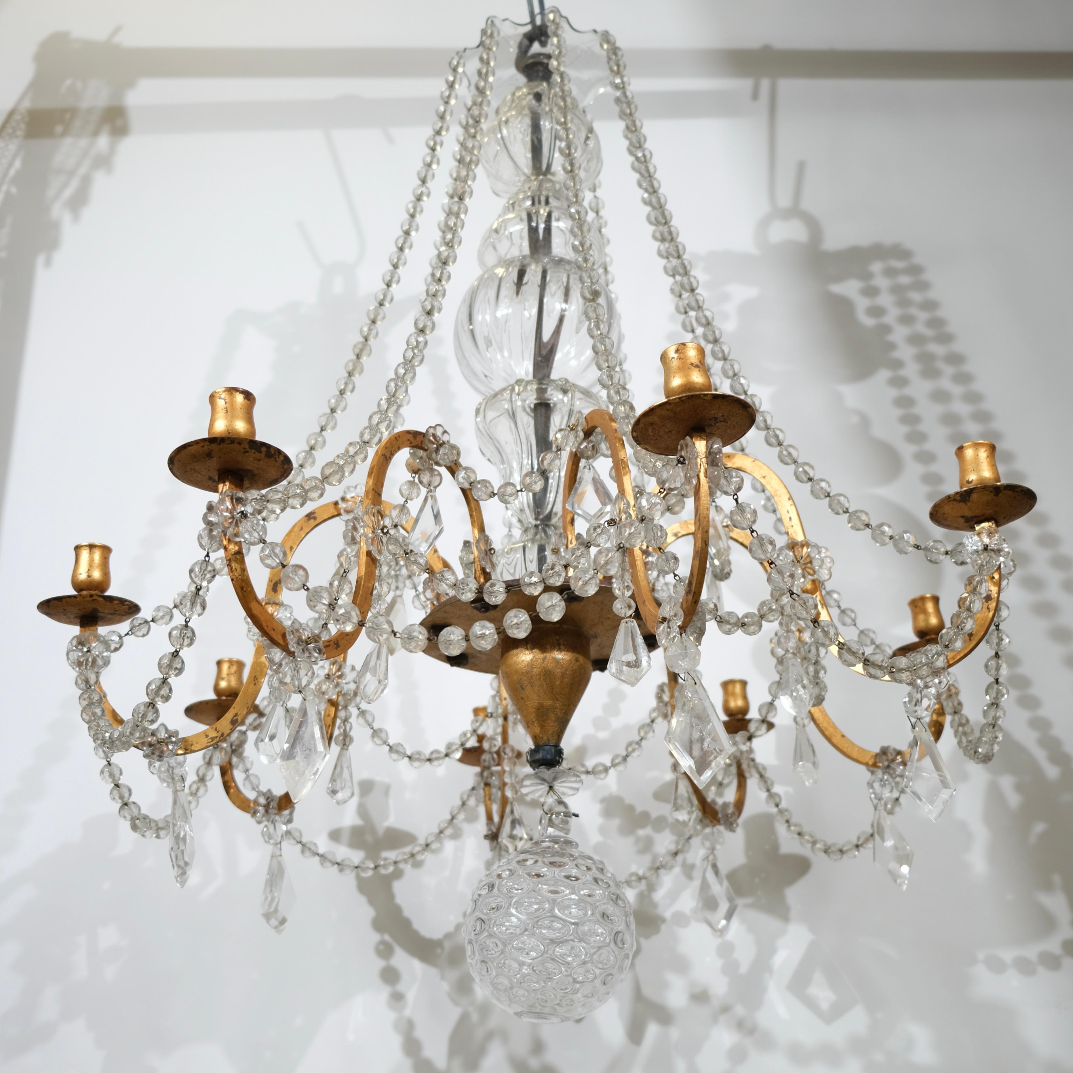 Cristallo Antico lampadario a otto luci in ferro e cristallo. Inizio del XIX secolo. in vendita