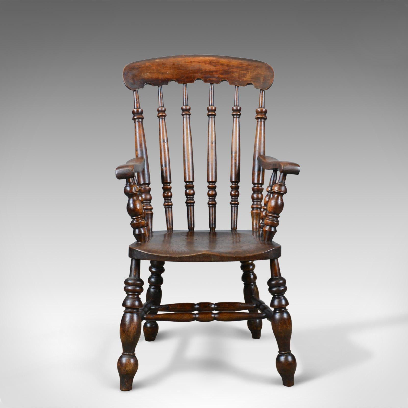 This is an antique elbow chair, an English, Victorian stick-back Windsor chair in elm dating to the late 19th century, circa 1880.

Appealing colour and a desirable aged patina
Grain interest to the thick elm, saddle seat slab
Attractive,