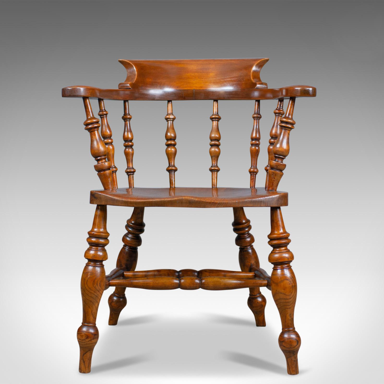 This is an antique elbow chair, an English, Victorian, elm, bow-back 'smokers', or 'captains' armchair dating to circa 1880.

An appealing country kitchen, bow back elbow chair
Grain interest to the elm and fruitwood in a wax polished
