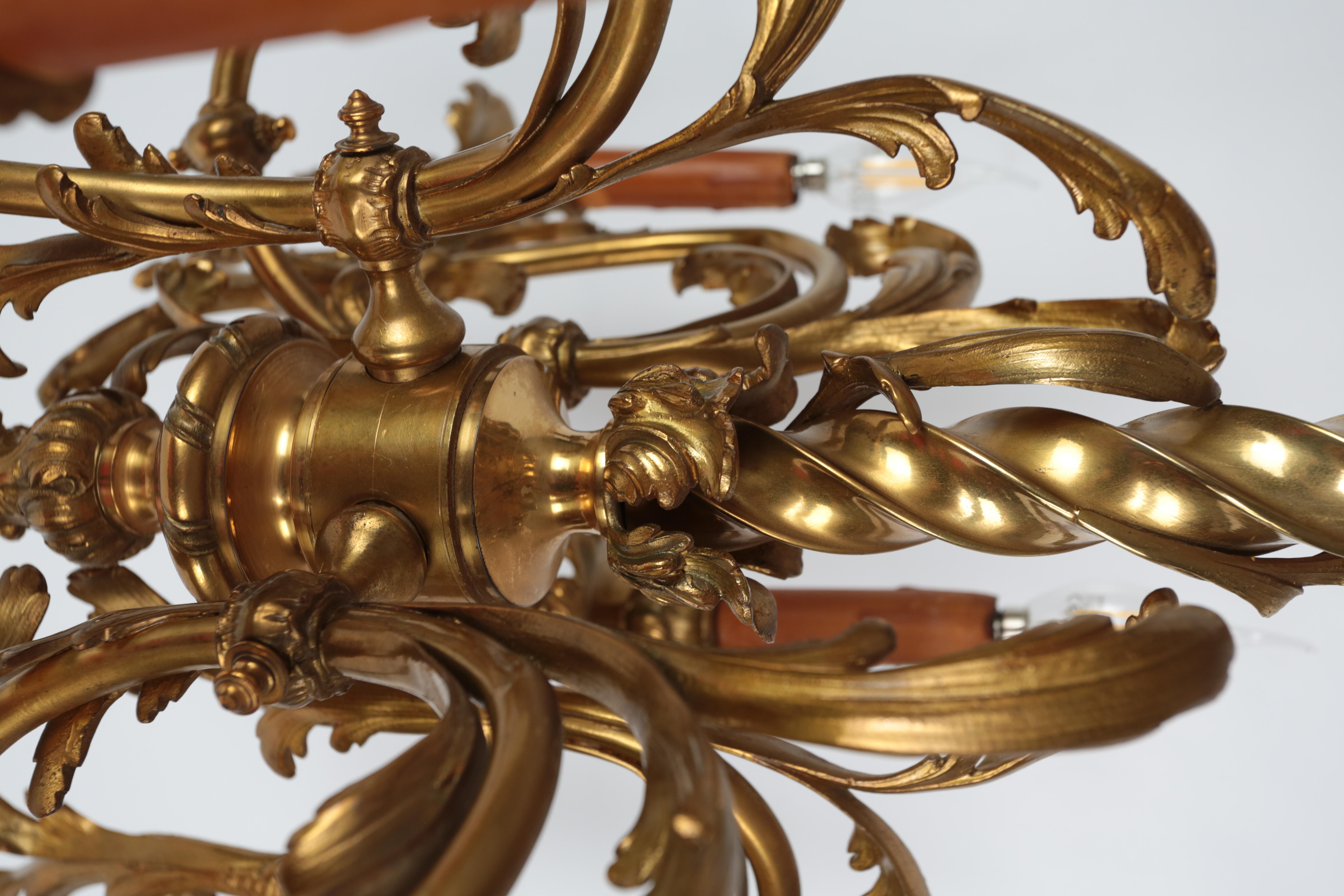 Cast Antique electrified bronze chandelier For Sale