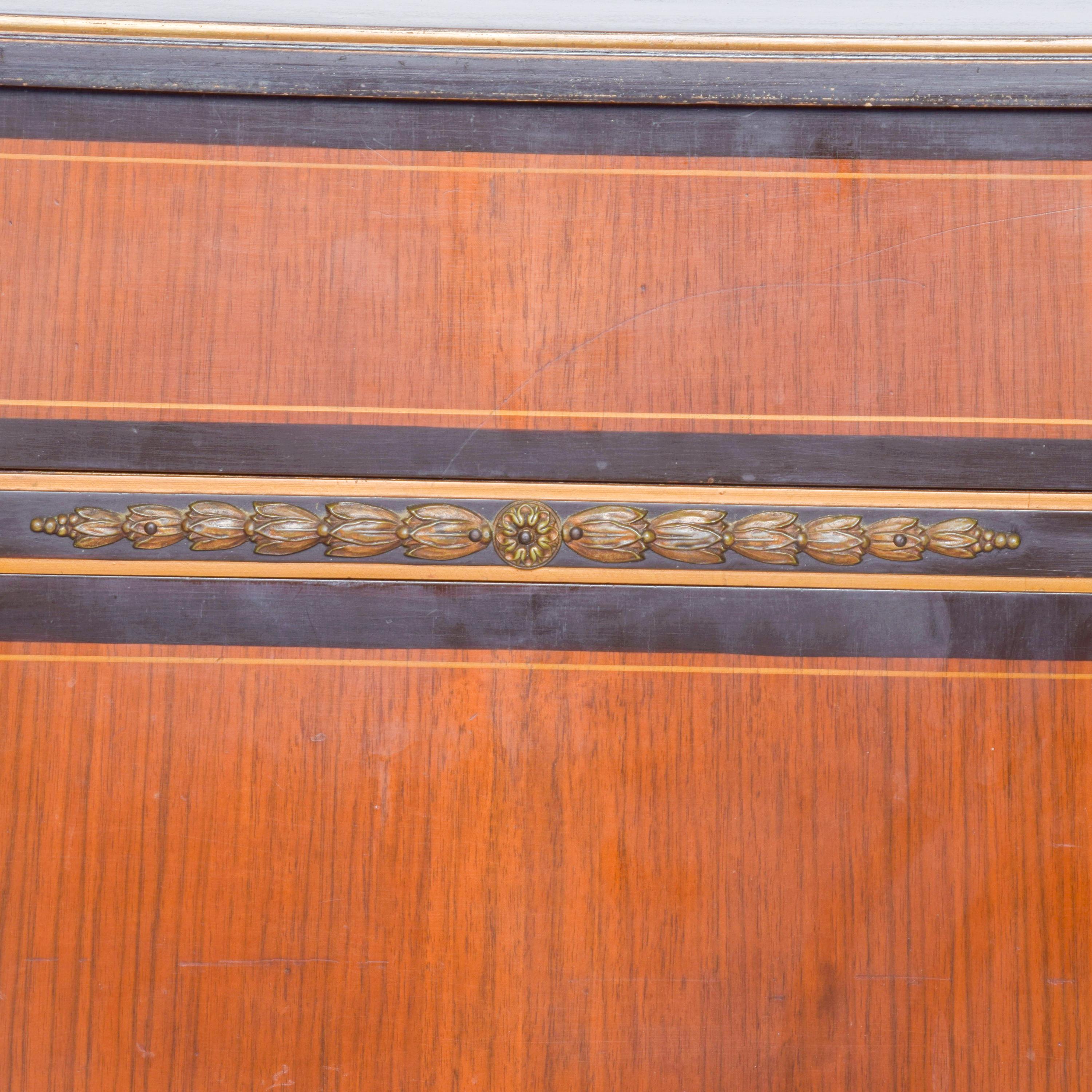 AMBIANIC presents
1940s Antique Elegant Neoclassical Wood Dresser Bronze Details by Landstrom
Additional pieces to this bed set are available ask dealer.
Beautiful bronze pulls with draped design and bronze ornamentation.
34.63 H x 20.13D x