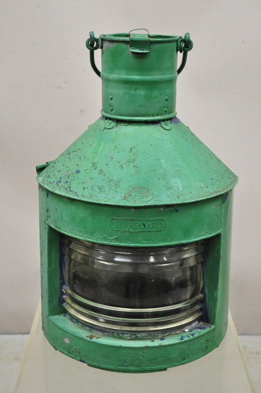 Antique Eli Griffith & Sons Green Marine Masthead Ship Lantern Fixture. Item features green painted finish, blue reflector, original tag, very nice antique item, great style and form. Circa Early 1900s Measurements: 23