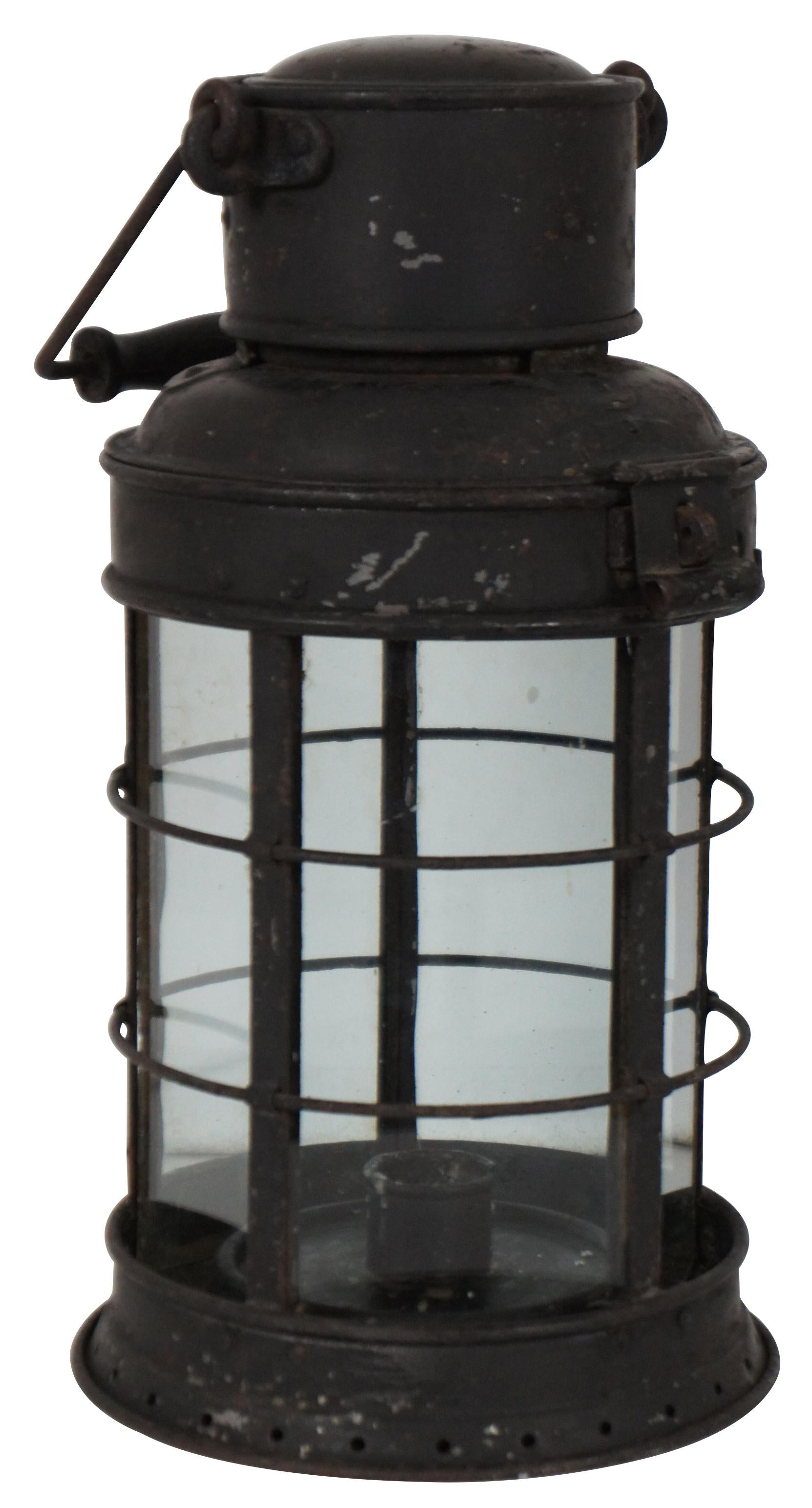 Circa 1880 - 1910 - this is a late Victorian candle lit lamp, most likely for Railway use, and was made by the firm Eli Griffiths and Son who were well known for manufacturing items for railways and shipping.
Made for candles and not oil