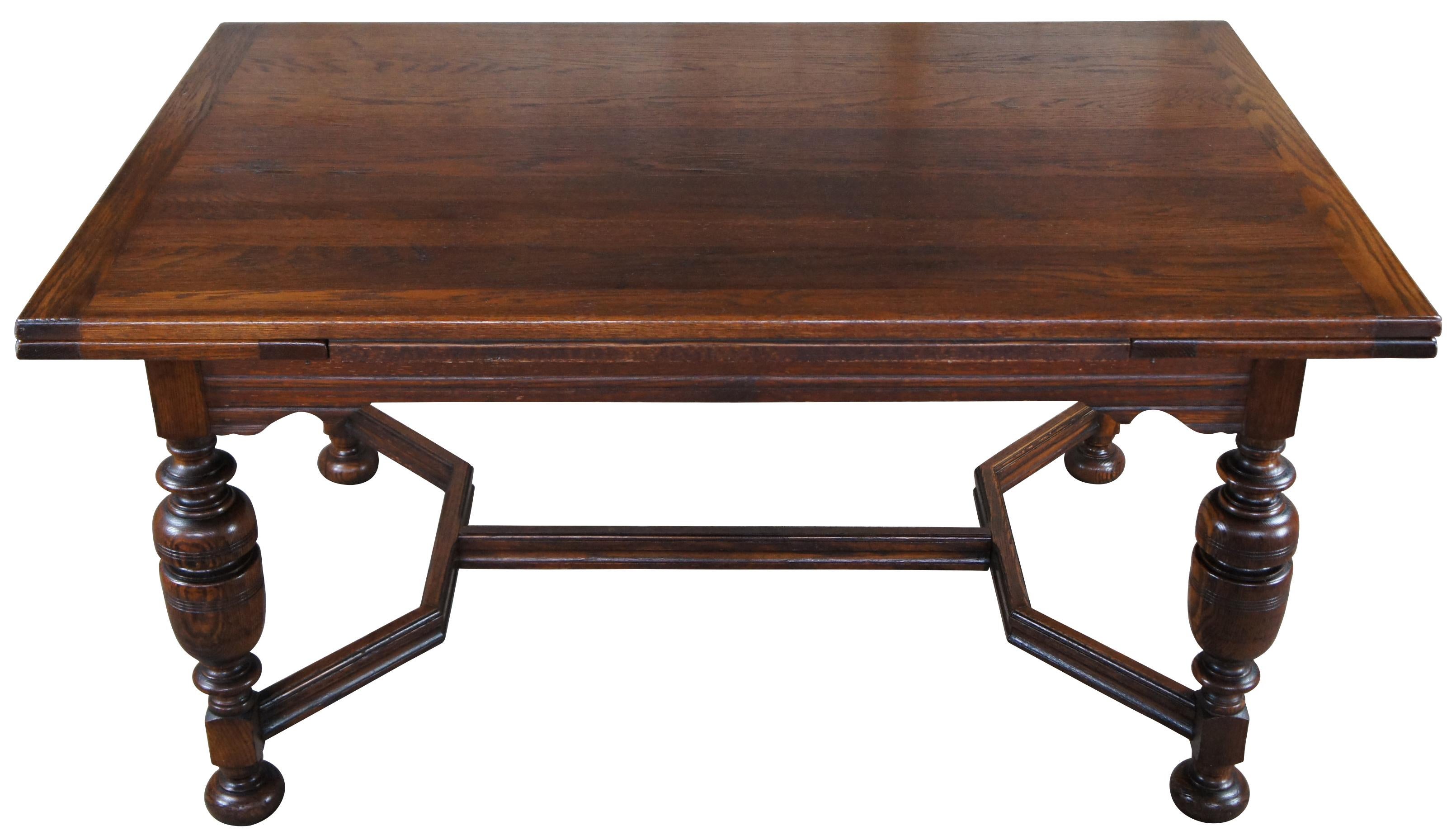 An impressive early 20th century Elizabethan or Jacobean style Oak Draw-Leaf table. Features a plank top with pull-out leaves on each end, Bulbous carved legs and bun feet connected by stretchers.

Measures: 38