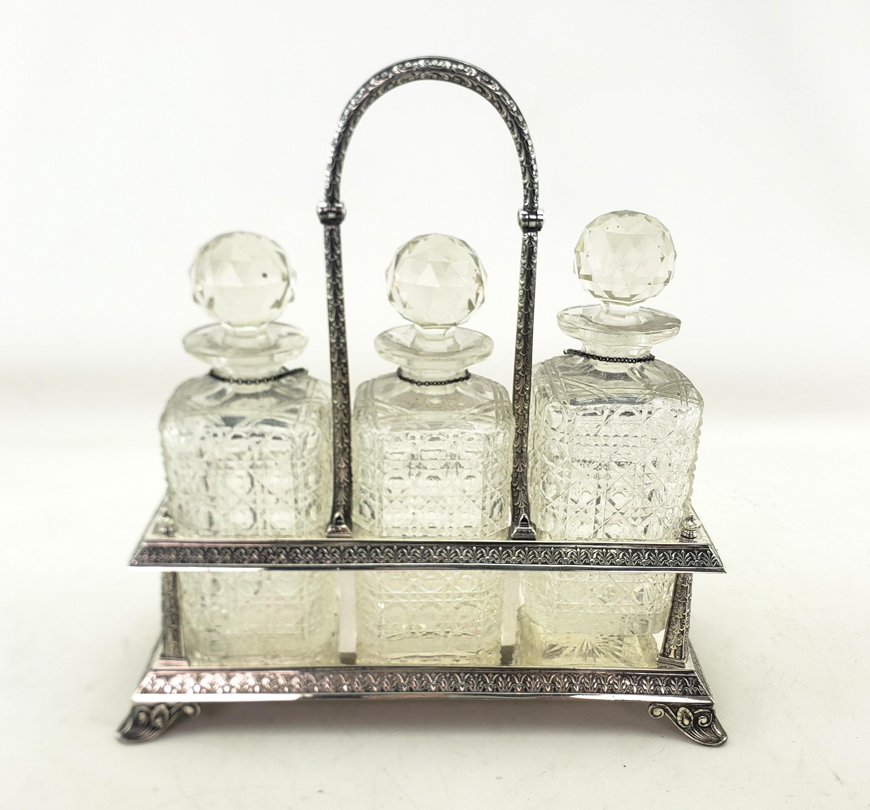 Hand-Crafted Antique Elkington Silver Plated Tantalus with 3 Cut Crystal Liquor Decanters For Sale