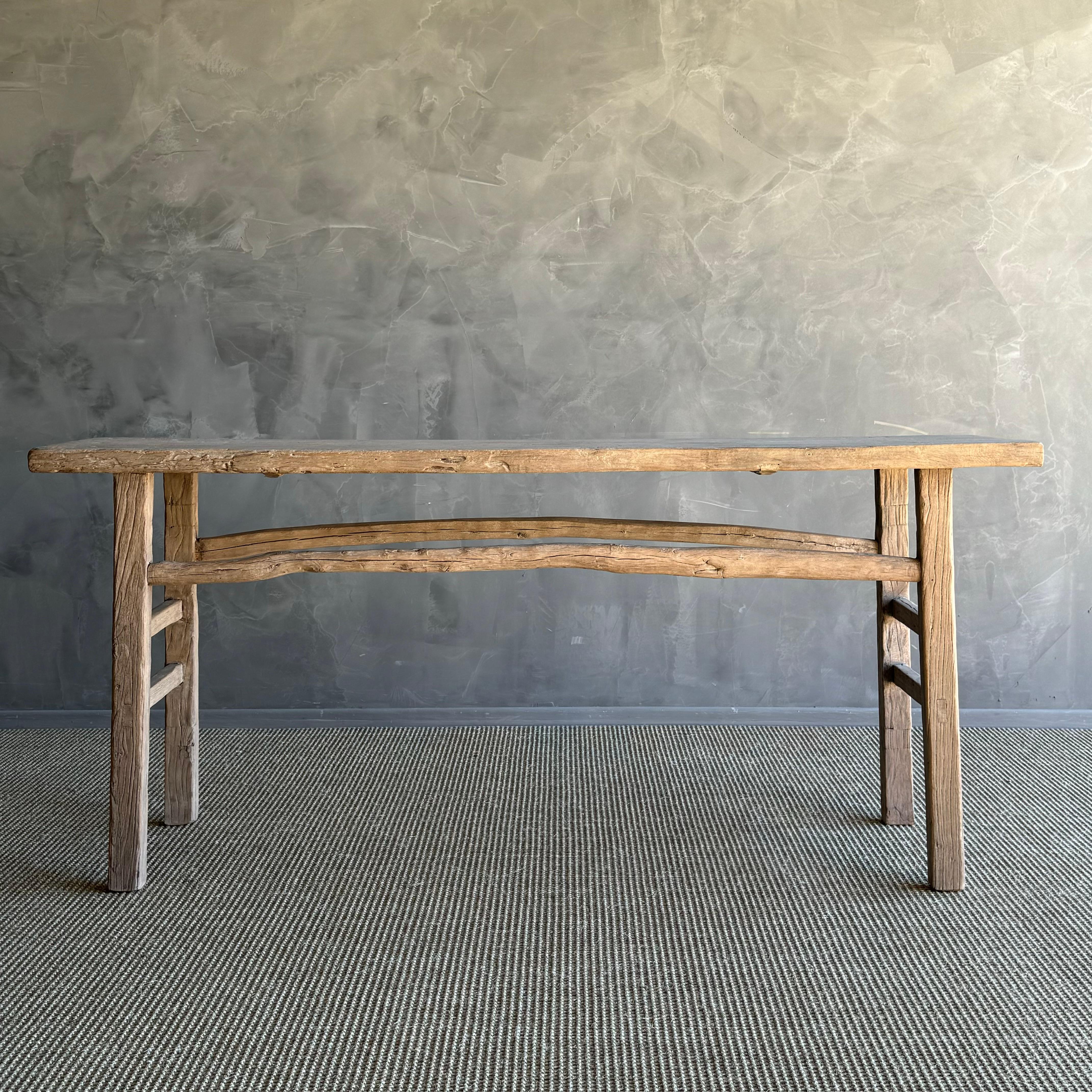 Introducing a stunning vintage elm wood console table, featuring authentic elm wood with original natural wood patina. This rare find will bring a touch of wabi sabi aesthetic to your home, adding a unique and timeless charm to your space.