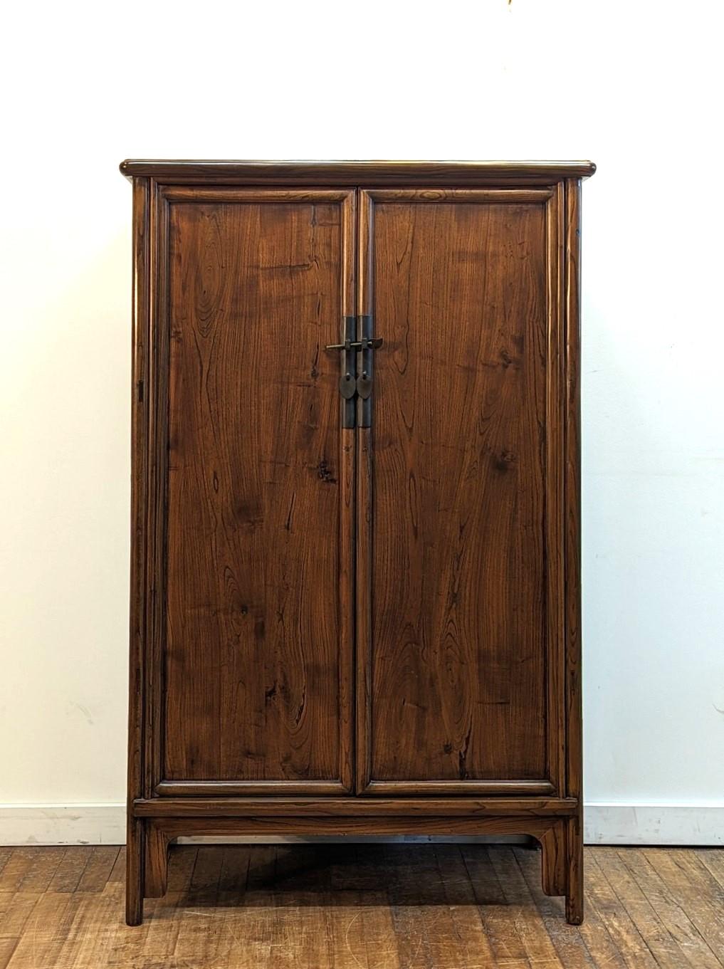 Antique Round Corner Tapered Cabinet.  Solid elm wood round corner cabinet with tapering silhouette in a style of the Ming Dynasty.   Traditional tenon and mortise joinery of a past century having a modernist and minimal style today.  Wonderfully